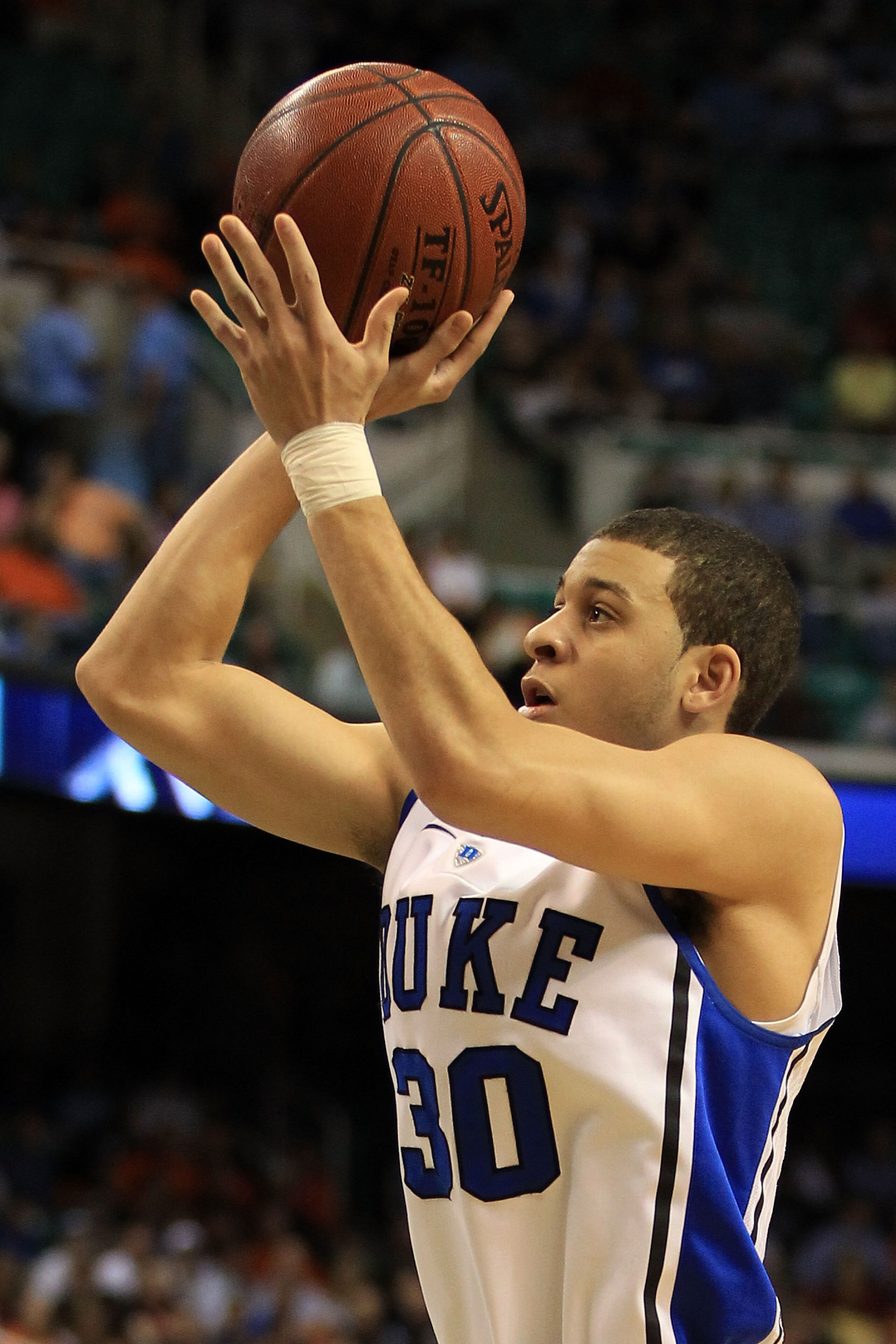 GREENSBORO, NC - MARCH 12:  Seth Curry #30 of the Duke Blue Devils shoots against the Virginia Tech Hokies during the first half in the semifinals of the 2011 ACC men's basketball tournament at the Greensboro Coliseum on March 12, 2011 in Greensboro, Nort