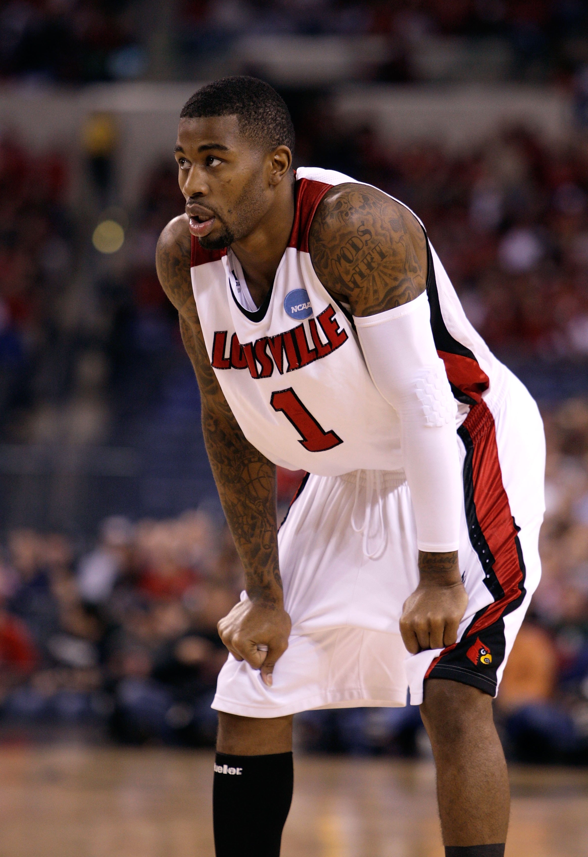 INDIANAPOLIS - MARCH 29:  Terrence Williams #1 of the Louisville Cardinals looks on against the Michigan State Spartans during the fourth round of the NCAA Division I Men's Basketball Tournament at the Lucas Oil Stadium on March 29, 2009 in Indianapolis,