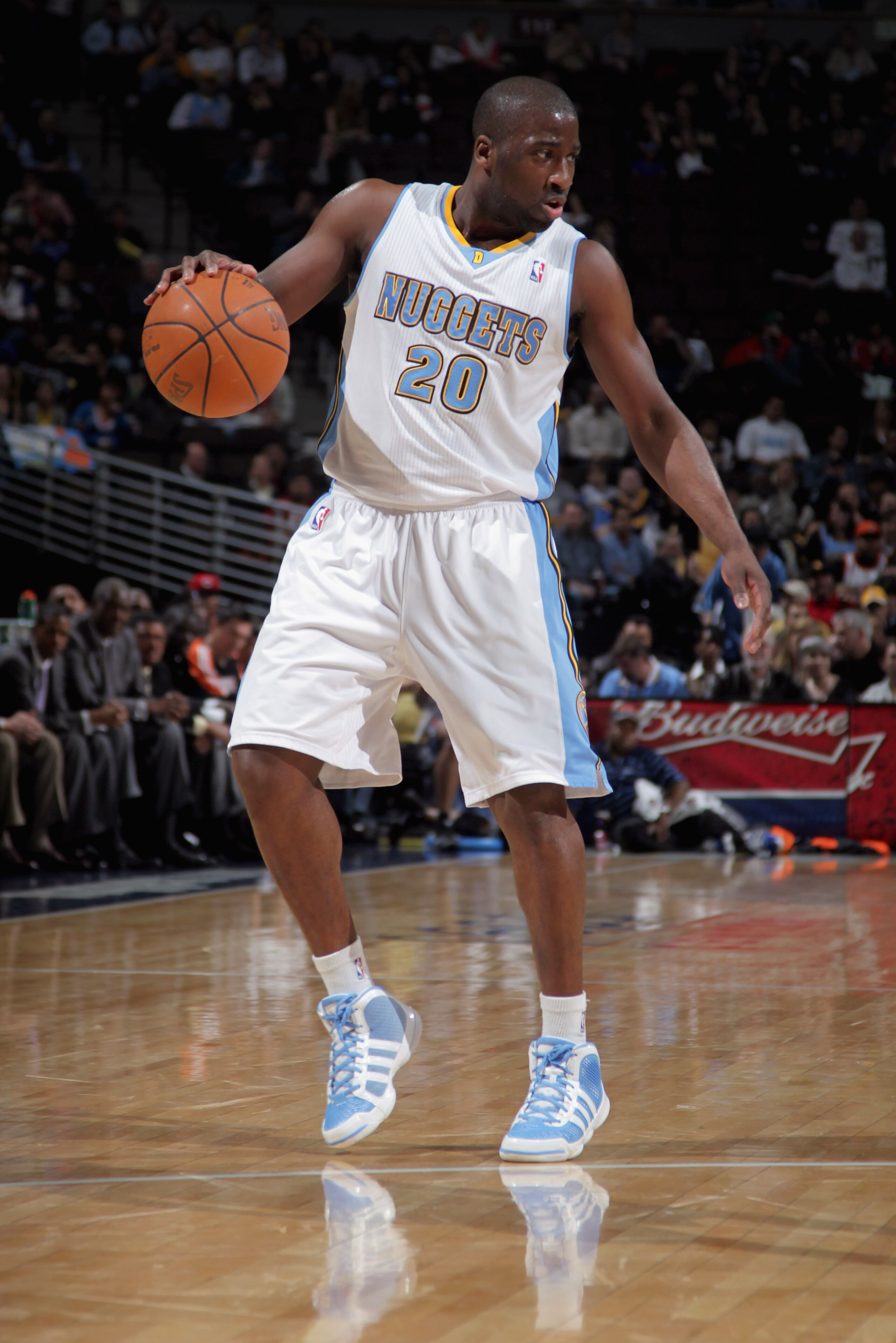 DENVER, CO - MARCH 02:  Raymond Felton #20 of the Denver Nuggets dribbles the ball as he runs the offense against the Charlotte Bobcats at the Pepsi Center on March 2, 2011 in Denver, Colorado. The Nuggets defeated the Bobcats 120-80. NOTE TO USER: User e