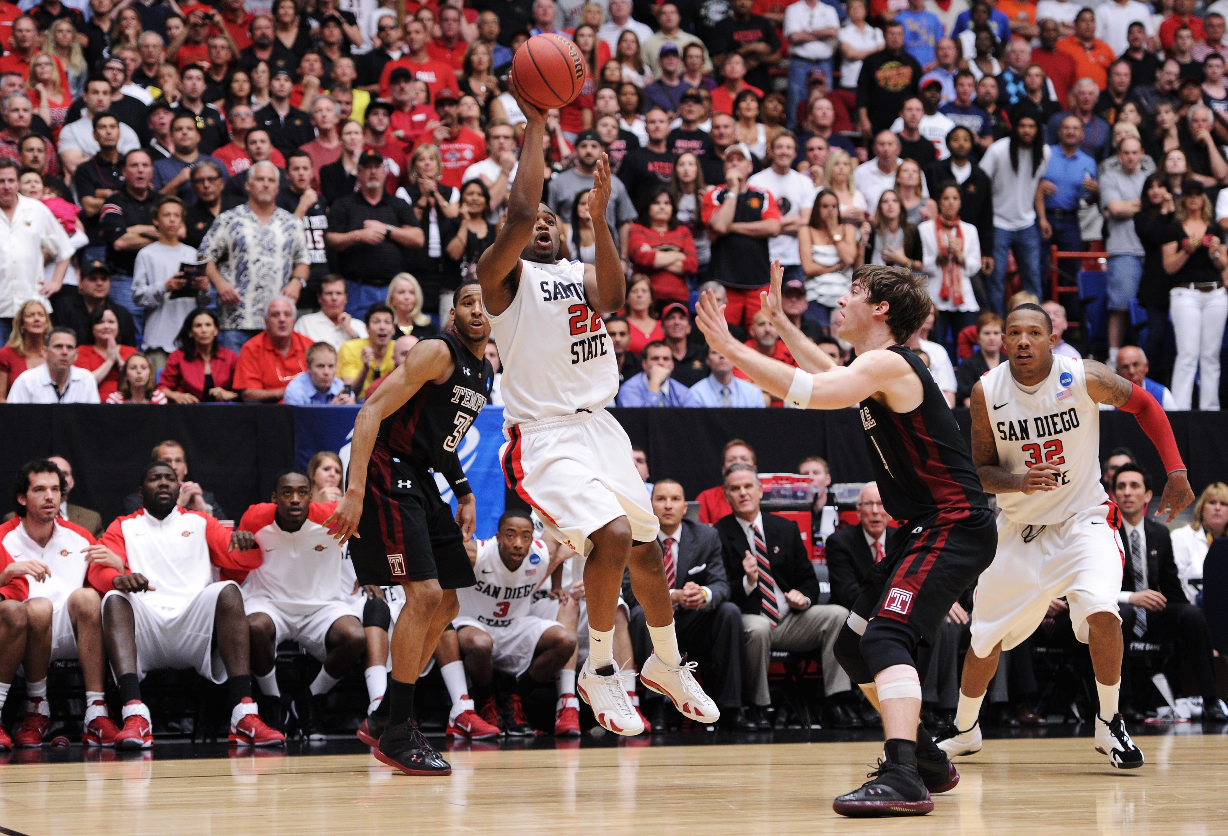 TUCSON, AZ - MARCH 19:  Chase Tapley #22 of the San Diego State Aztecs misses a shot against the Temple Owls in the final seconds of the second half sending the game into overtime during the third round of the 2011 NCAA men's basketball tournament at McKa