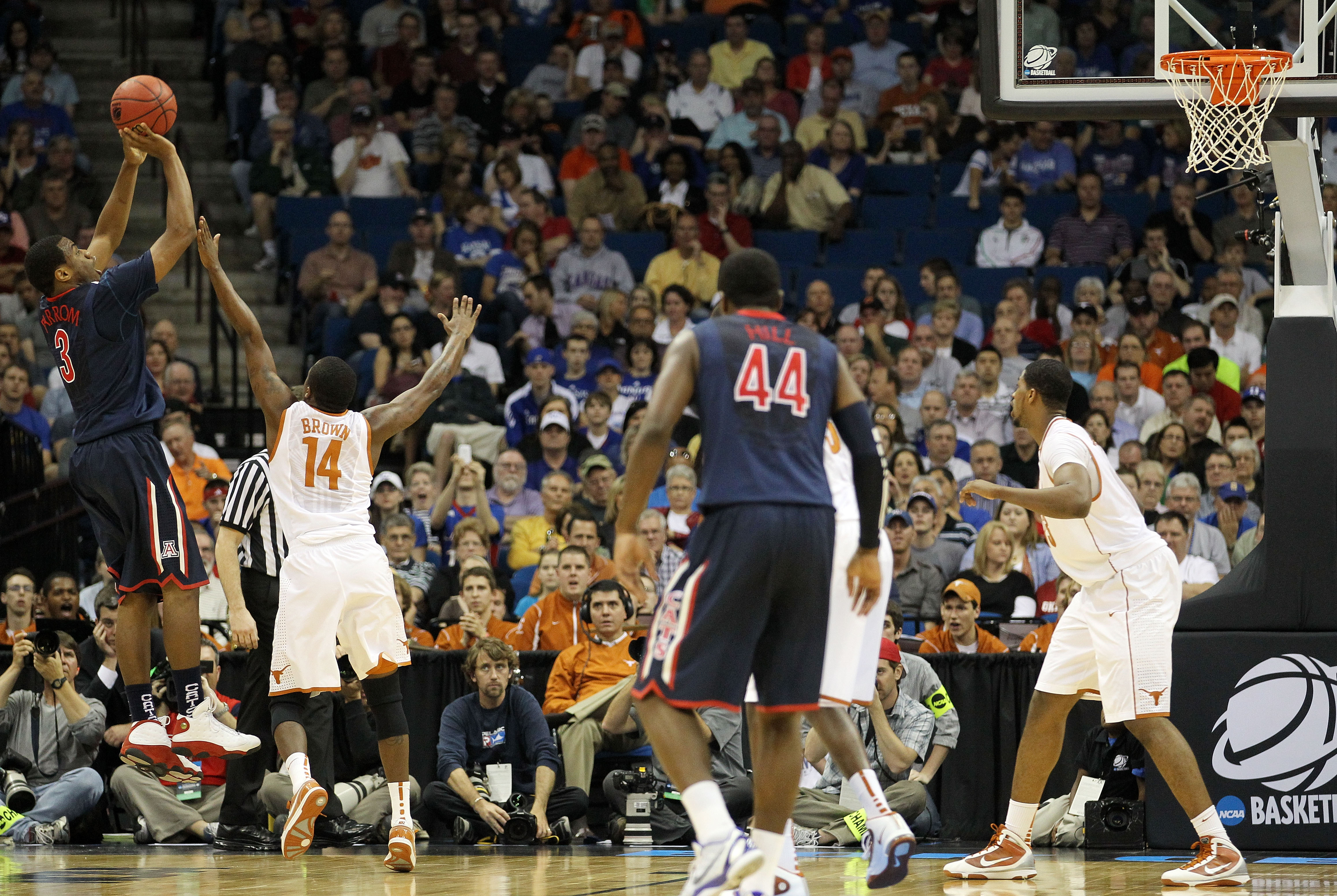 TULSA, OK - MARCH 20:  Kevin Parrom #3 of the Arizona Wildcats takes a shot against the Texas Longhorns during the third round of the 2011 NCAA men's basketball tournament at BOK Center on March 20, 2011 in Tulsa, Oklahoma.  (Photo by Ronald Martinez/Gett