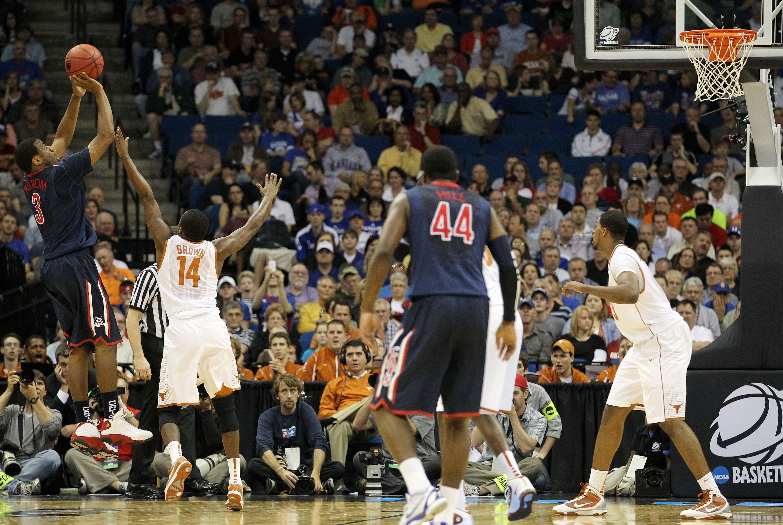 TULSA, OK - MARCH 20:  Kevin Parrom #3 of the Arizona Wildcats takes a shot against the Texas Longhorns during the third round of the 2011 NCAA men's basketball tournament at BOK Center on March 20, 2011 in Tulsa, Oklahoma.  (Photo by Ronald Martinez/Gett