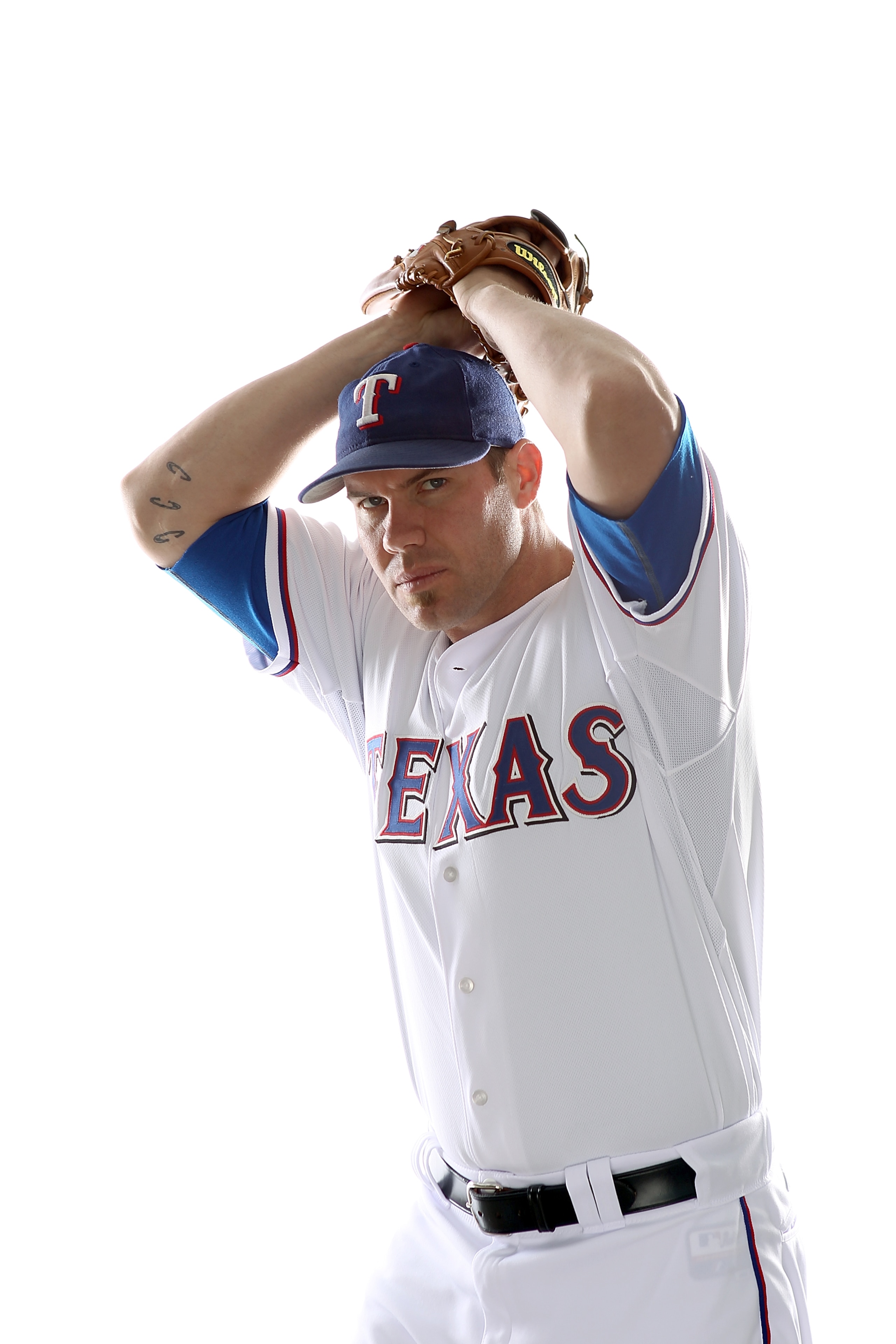 SURPRISE, AZ - FEBRUARY 25:  Colby Lewis #48 of the Texas Rangers poses for a portrait during Spring Training Media Day on February 25, 2011 at Surprise Stadium in Surprise, Arizona.  (Photo by Jonathan Ferrey/Getty Images)