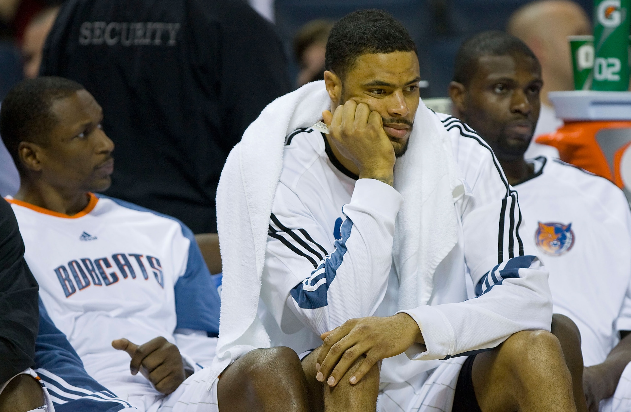 CHARLOTTE, NC - APRIL 26:  (L-R) Theo Ratliff #42, Tyson Chandler #6 and Nazr Mohammed #13 of the Charlotte Bobcats sit on the bench during the final minutes of their game against the Orlando Magic in Game Four of the Eastern Conference Quarterfinals duri