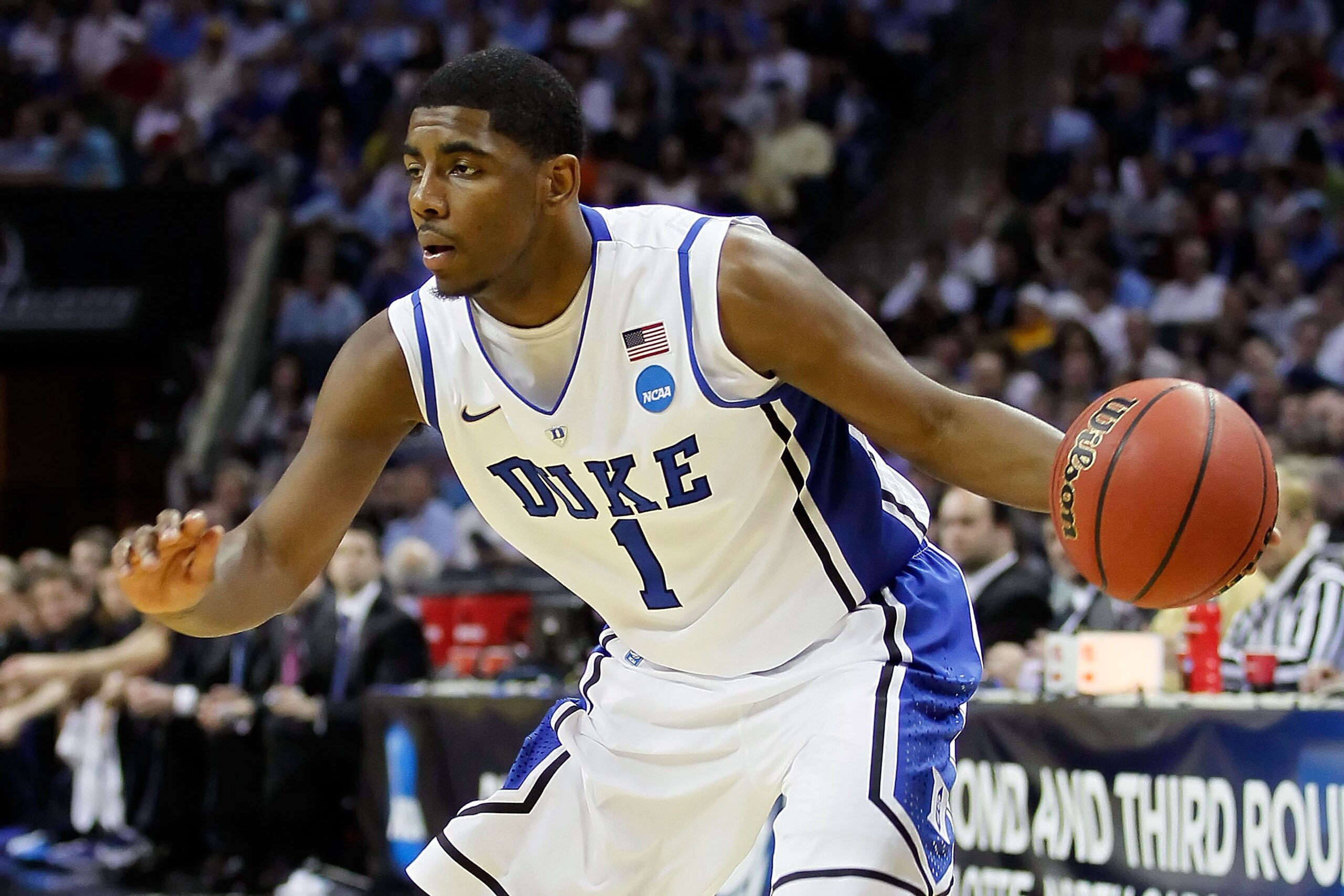 CHARLOTTE, NC - MARCH 20: Kyrie Irving #1 of the Duke Blue Devils moves the ball while taking on the Michigan Wolverines during the third round of the 2011 NCAA men's basketball tournament at Time Warner Cable Arena on March 20, 2011 in Charlotte, North CHARLOTTE, NC - MARCH 20: Kyrie Irving #1 of the Duke Blue Devils moves the ball while taking on the Michigan Wolverines during the third round of the 2011 NCAA men's basketball tournament at Time Warner Cable Arena on March 20, 2011 in Charlotte, North