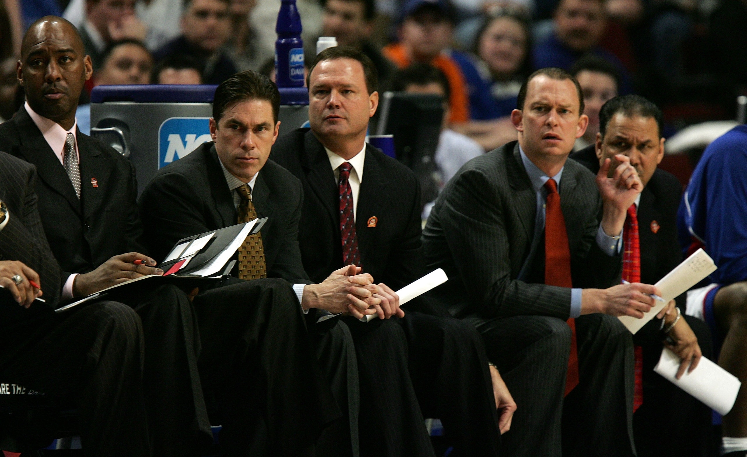 CHICAGO - MARCH 16:  (L-R) Danny Manning (Dir. of Student-Athlete Dev./Manager), Tim Jankovich (assistant coach), Head coach Bill Self, Joe Dooley (assitant coach) and Kurtis Townsend (assitant coach) of the Kansas Jayhawks watch the action from the bench