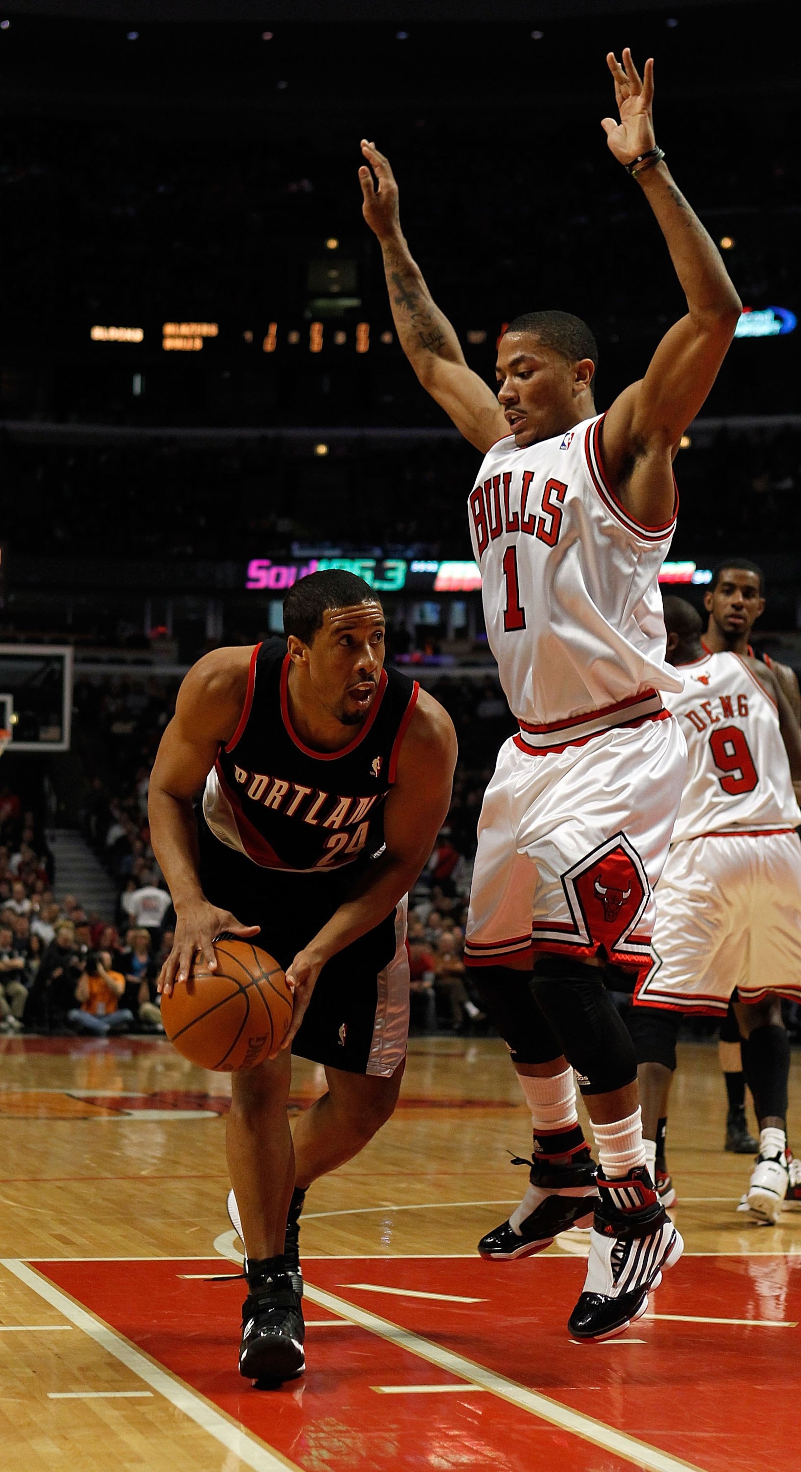 CHICAGO - FEBRUARY 26: Andre Miller #24 of the Portland Trail Blazers looks to pass as Derrick Rose #1 of the Chicago Bulls defends at the United Center on February 26, 2010 in Chicago, Illinois. The Bulls defeated the Trail Blazers 115-111 in overtime. N