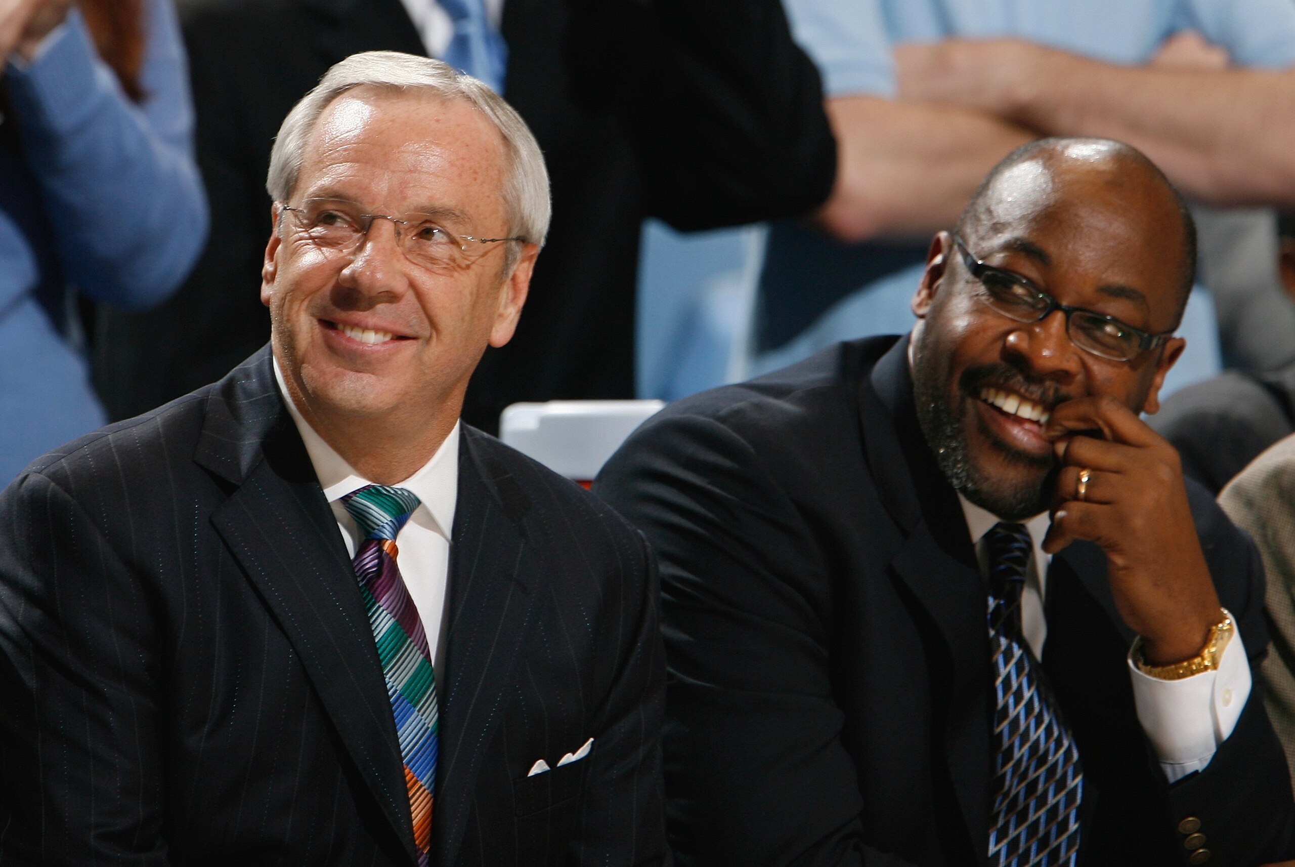 CHAPEL HILL, NC - DECEMBER 19:  Head Coach Roy Williams and Assitant Coach Steve Robinson of the North Carolina Tar Heels enjoy the action from the bench during the game against the Nicholls State Colonels during the second half at the Dean E. Smith Cente