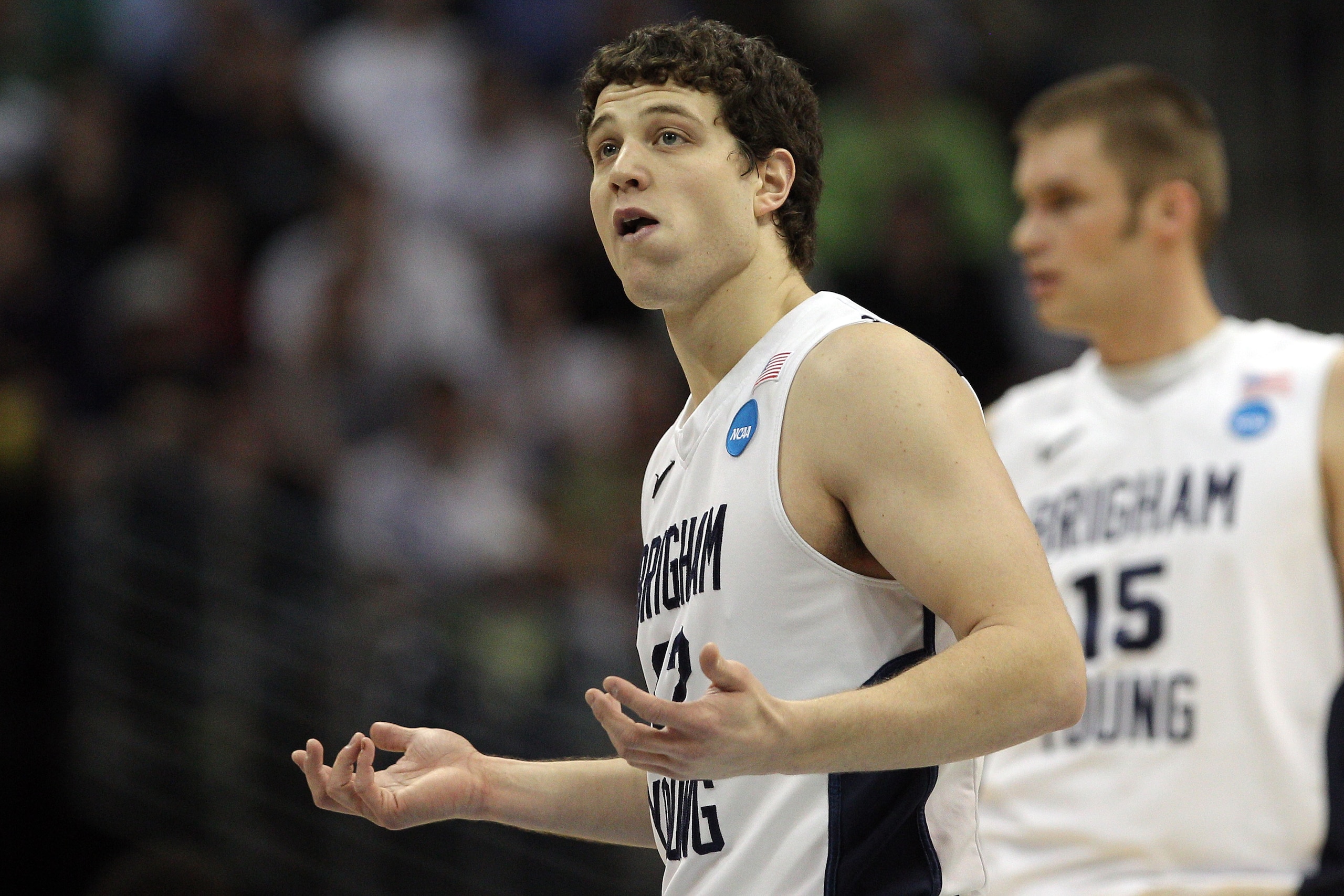 DENVER, CO - MARCH 17:  Jimmer Fredette #32 of the Brigham Young Cougars reacts while playing against the Wofford Terriers during the second round of the 2011 NCAA men's basketball tournament at Pepsi Center on March 17, 2011 in Denver, Colorado.  (Photo