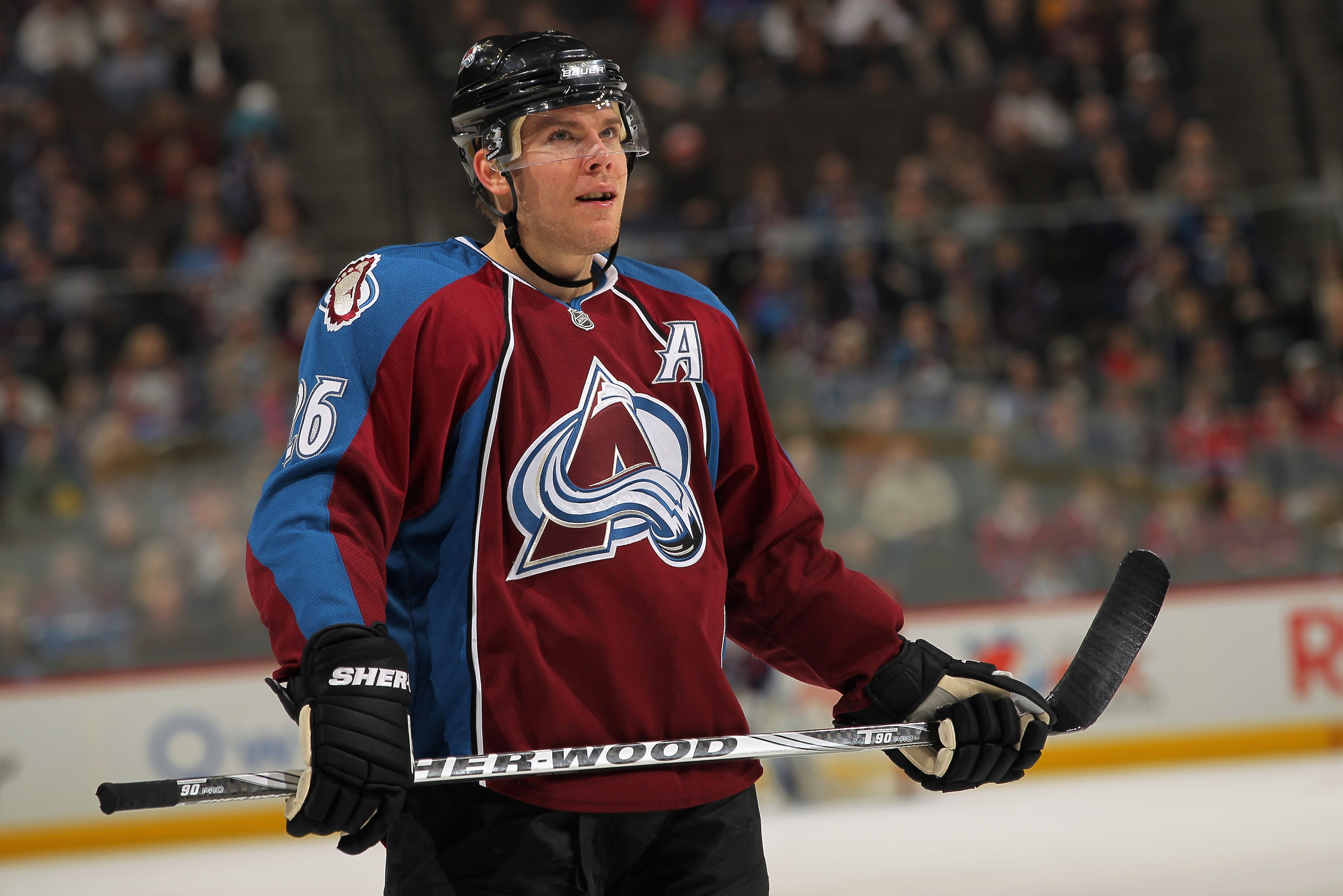 DENVER, CO - JANUARY 18:  Paul Stastny #26 of the Colorado Avalanche looks on during a break in the action against the Vancouver Canucks at the Pepsi Center on January 18, 2011 in Denver, Colorado. The Avalanche defeated the Canucks 4-3 in overtime.  (Pho
