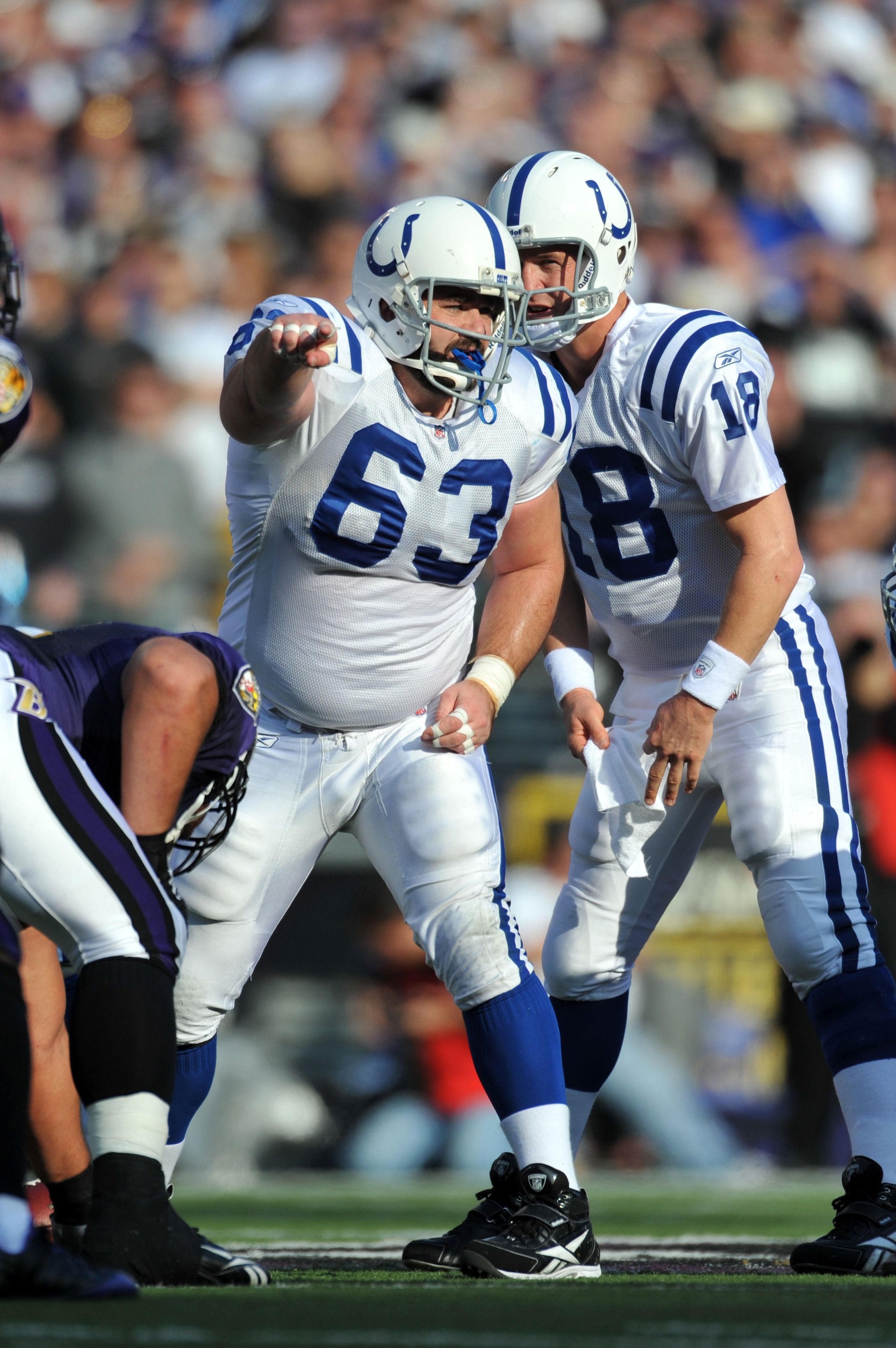 BALTIMORE - NOVEMBER 22:  Jeff Saturday #63 of the Indianapolis Colts signals to the offensive line during the game against the Baltimore Ravens at M&T Bank Stadium on November 22, 2009 in Baltimore, Maryland. The Colts defeated the Ravens 17-15. (Photo b