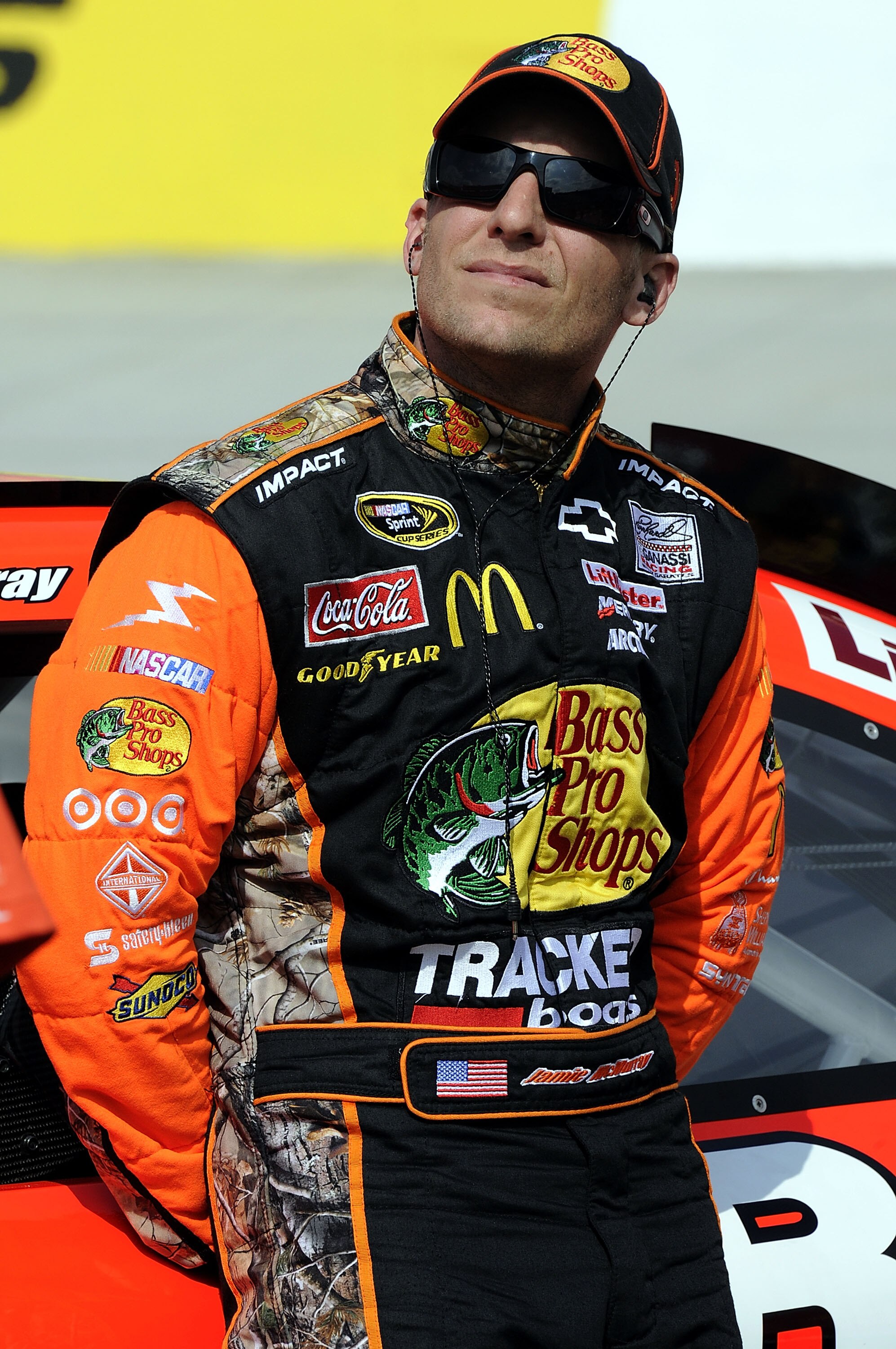 BRISTOL, TN - MARCH 18:  Jamie McMurray, driver of the #1 Bass Pro Shops/Tracker Chevrolet, stands on the grid during qualifying for the NASCAR Sprint Cup Series Jeff Byrd 500 Presented By Food City at Bristol Motor Speedway on March 18, 2011 in Bristol,