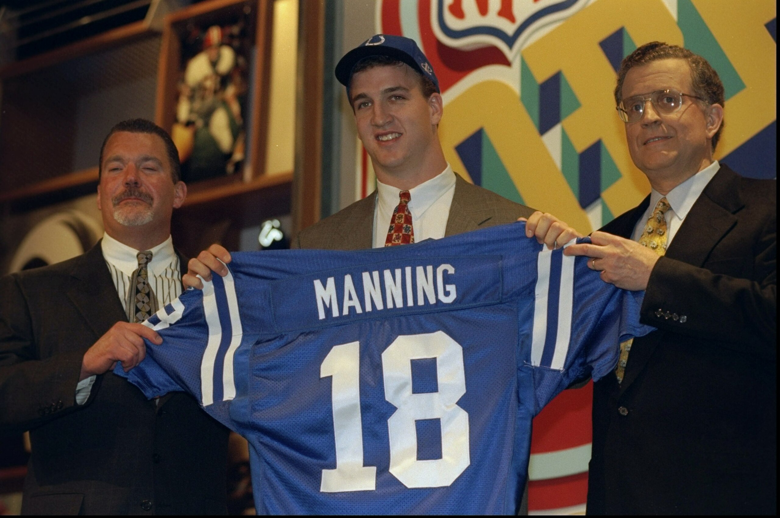 18 Apr 1998:  Quarterback Peyton Manning (center) stands with NFL Commissioner Paul Tagliabue and the owner of the Indianapolis Colts during the NFL draft at Madison Square Garden in New York City, New York. Mandatory Credit: Ezra O. Shaw  /Allsport