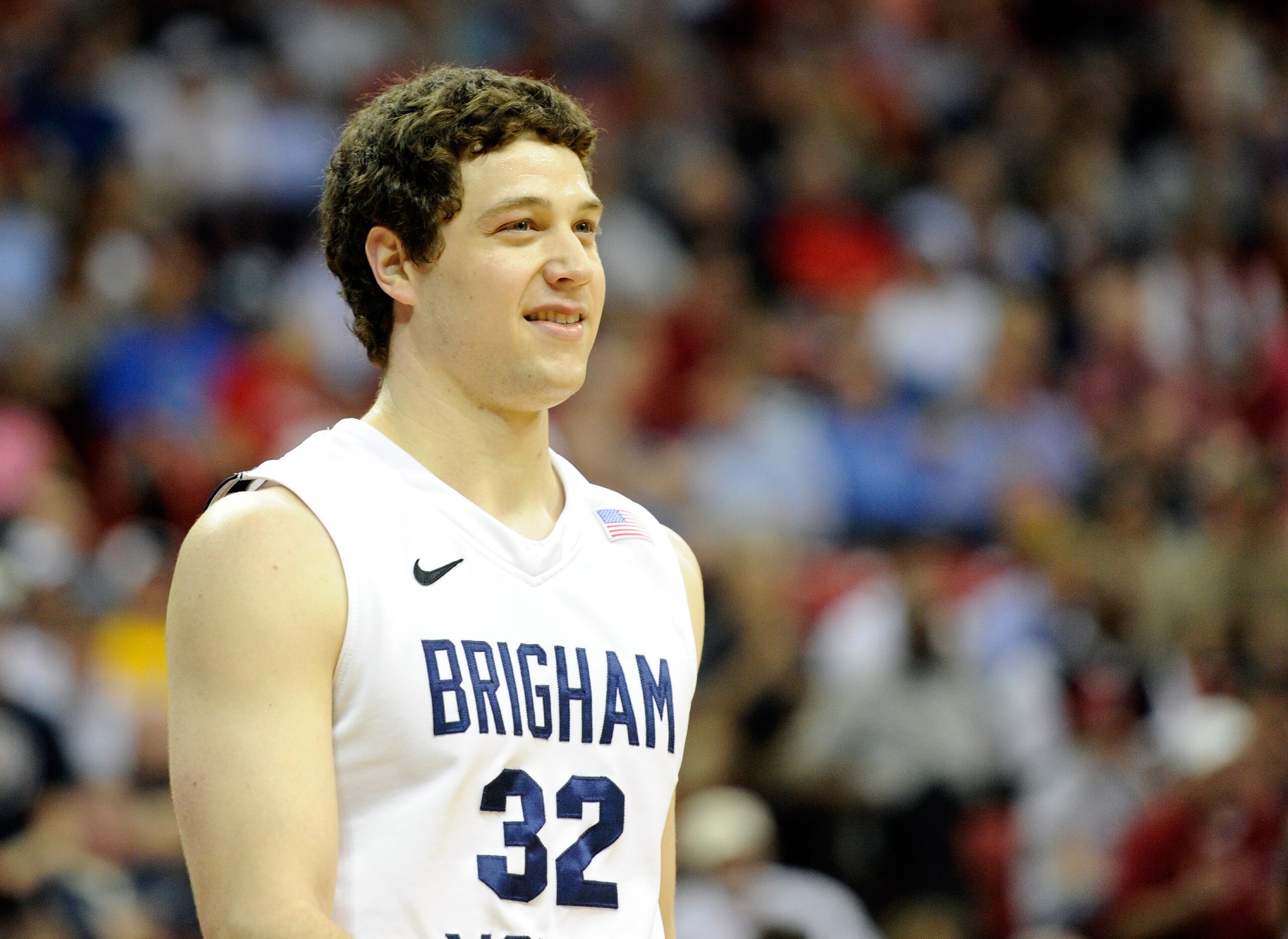 LAS VEGAS, NV - MARCH 10:  Jimmer Fredette #32 of the Brigham Young University Cougars smiles late in a quarterfinal game of the Conoco Mountain West Conference Basketball tournament against the Texas Christian University Horned Frogs at the Thomas & Mack