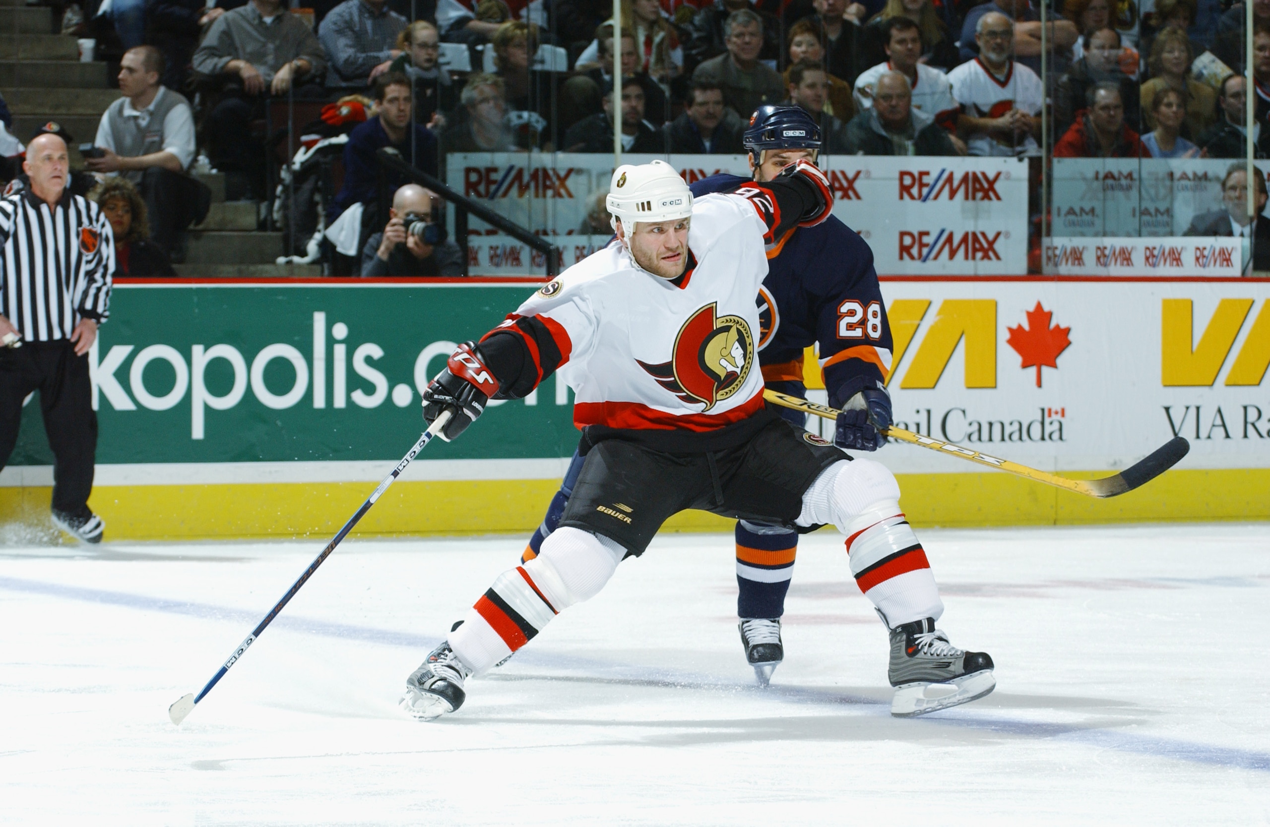 KANATA, CANADA - APRIL 17:  Vaclav Varada #26 of the Ottawa Senators stradles the blueline to prevent an offside as Jason Wiemer #28 of the New York Islanders chases him down during game five of the Eastern Conference Quarterfinals of the 2003 Stanley Cup