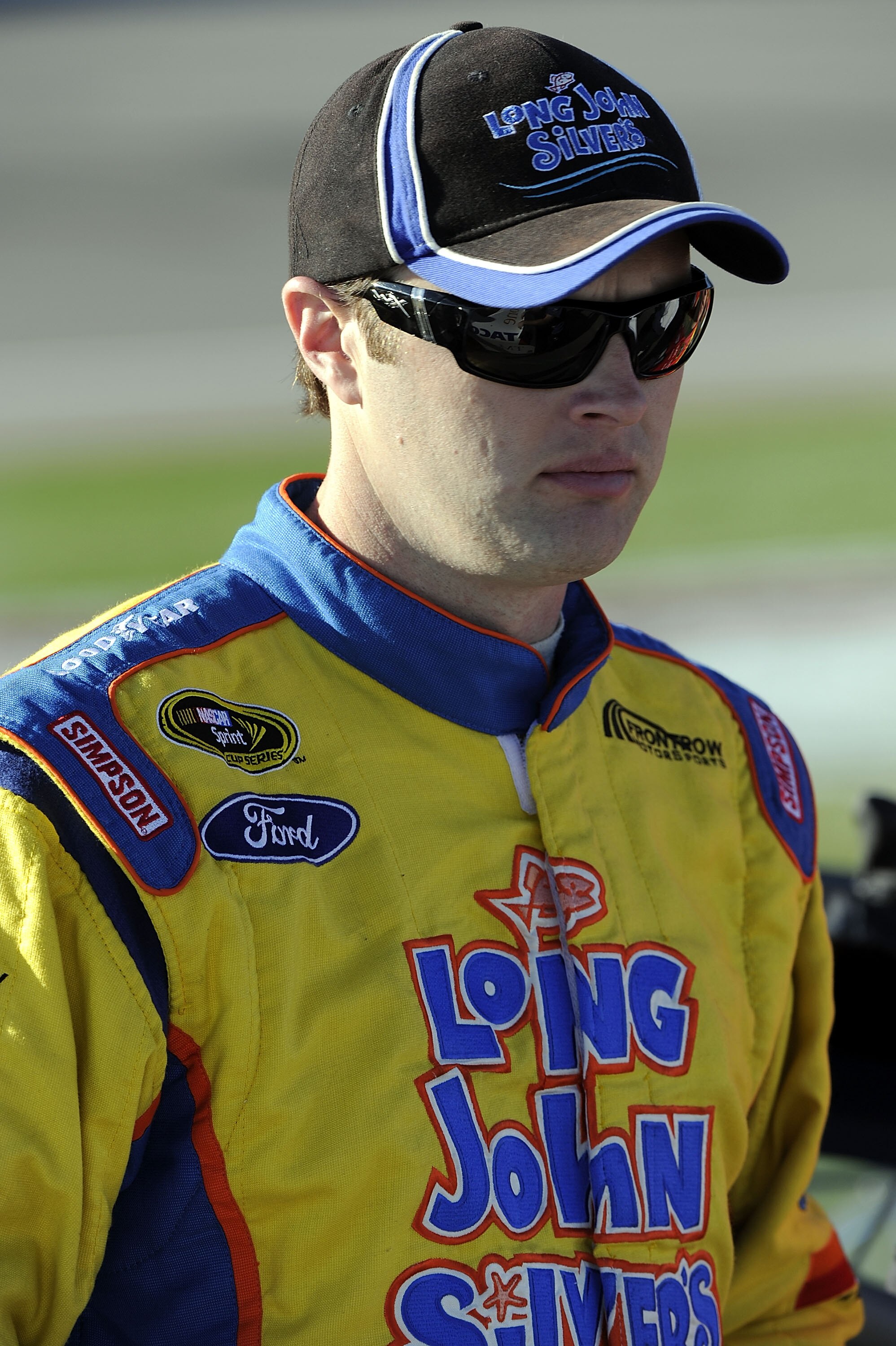 LAS VEGAS, NV - MARCH 04:  Travis Kvapil, driver of the #38 Long John Silver's Ford, walks on pit road during qualifying for the NASCAR Sprint Cup Series Kobalt Tools 400 at Las Vegas Motor Speedway on March 4, 2011 in Las Vegas, Nevada.  (Photo by John H