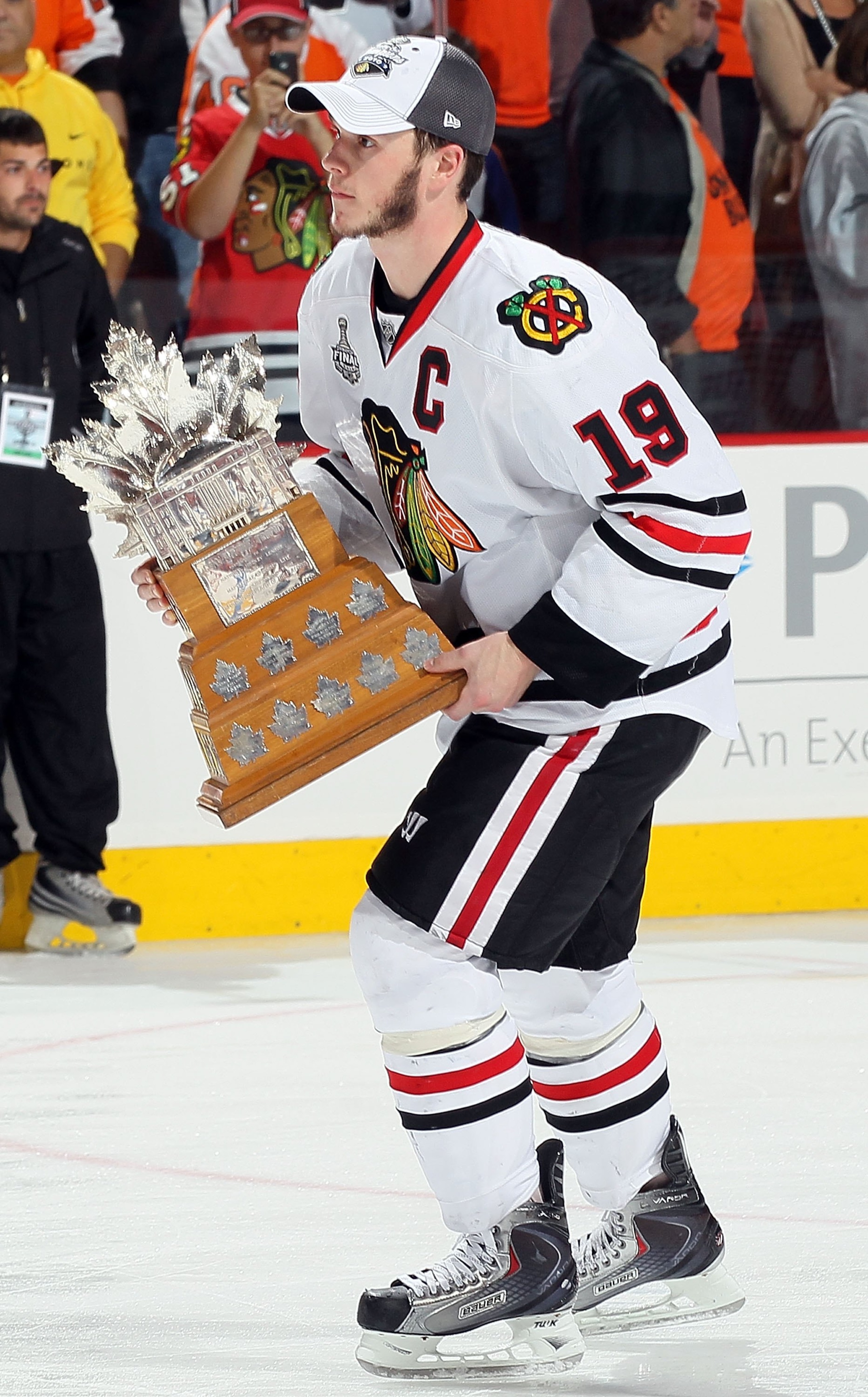 PHILADELPHIA - JUNE 09: Jonathan Toews #19 of the Chicago Blackhawks is awarded the Conn Smythe Trophy after the Blackhawks defeated the Philadelphia Flyers 4-3 to win the Stanley Cup in Game Six of the 2010 NHL Stanley Cup Final at the Wachovia Center on