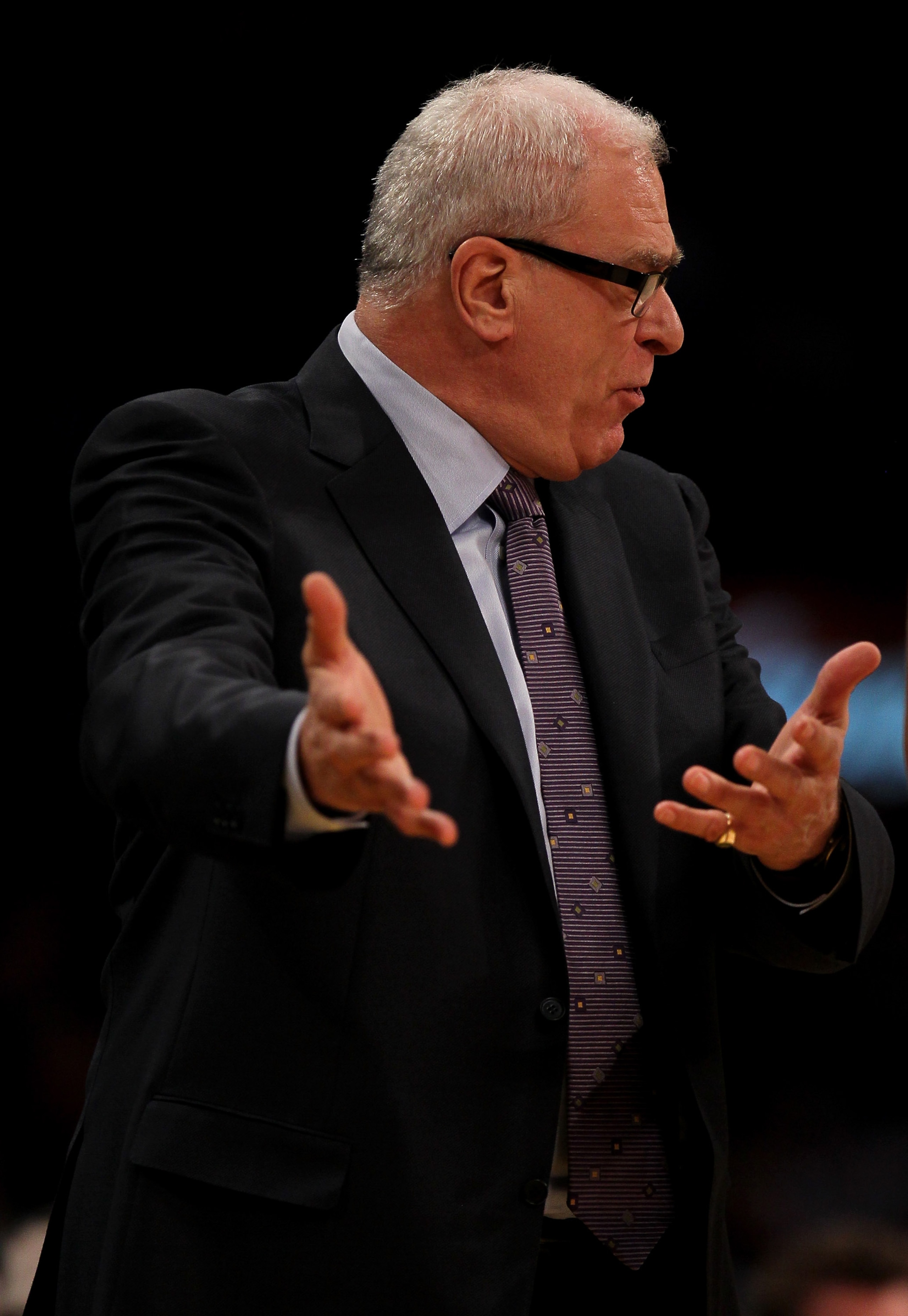 LOS ANGELES, CA - FEBRUARY 25:   Head coach Phil Jackson of the Los Angeles Lakers complains to a referee during the game with the Los Angeles Clippers at Staples Center on February 25, 2011 in Los Angeles, California. The Lakers won 108-95.  NOTE TO USER