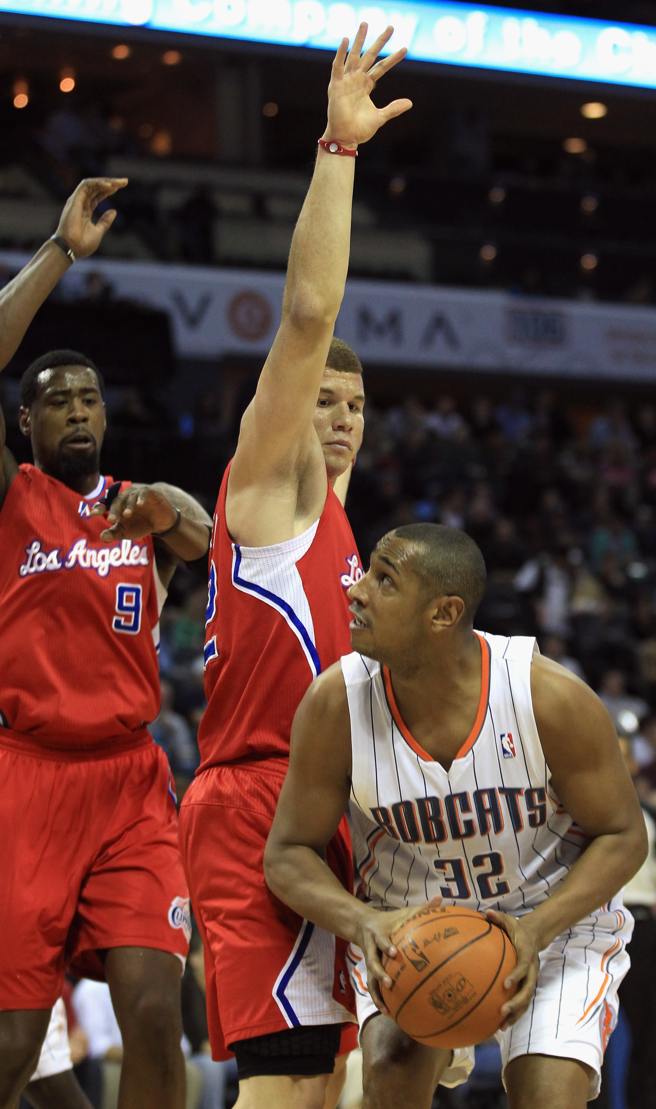 CHARLOTTE, NC - MARCH 07:  Teammates DeAndre Jordan #9 and Blake Griffin #32 of the Los Angeles Clippers try to stop Boris Diaw #32 of the Charlotte Bobcats during their game at Time Warner Cable Arena on March 7, 2011 in Charlotte, North Carolina. NOTE T