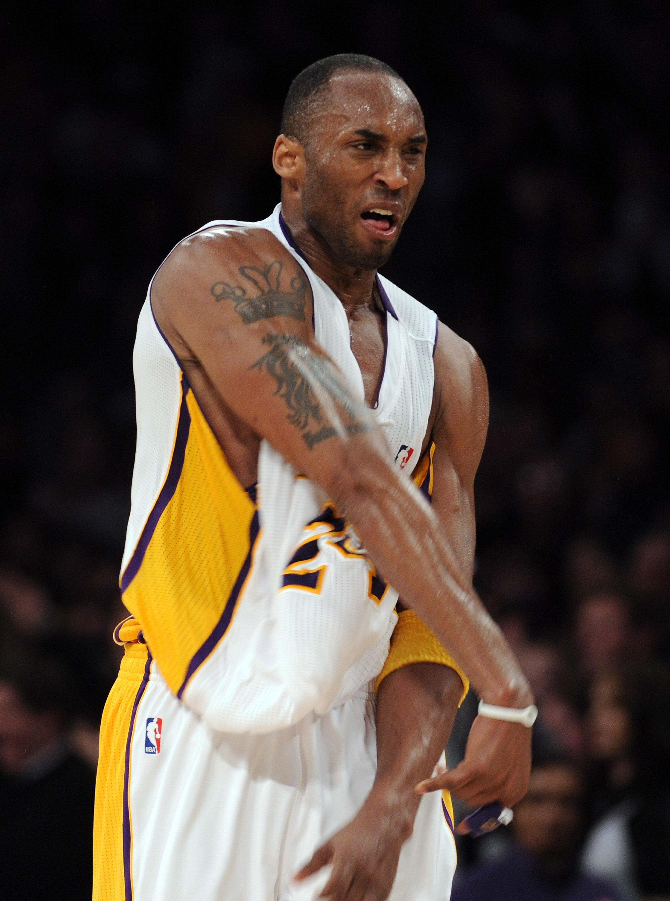 LOS ANGELES, CA - MARCH 20:  Kobe Bryant #24 of the Los Angeles Lakers celebrates his basket in the last minute on way to an 84-80 win over the  Portland Trail Blazers at the Staples Center on March 20, 2011 in Los Angeles, California.  NOTE TO USER: User