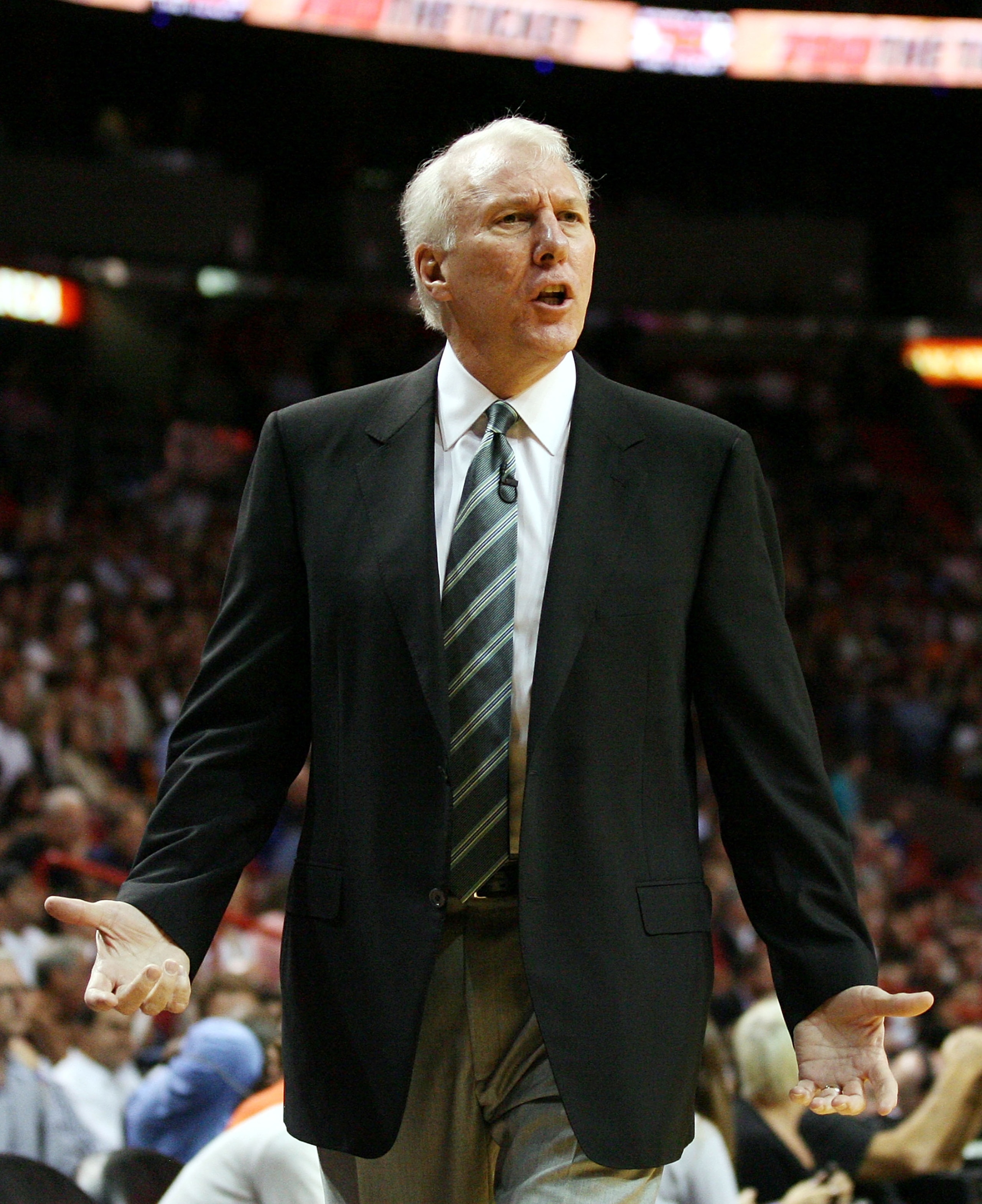 MIAMI - MARCH 14: San Antonio Spurs Coach Greg Popovich against the Miami Heat at American Airlines Arena on March 14, 2011 in Miami, Florida. NOTE TO USER: User expressly acknowledges and agrees that, by downloading and/or using this Photograph, User is