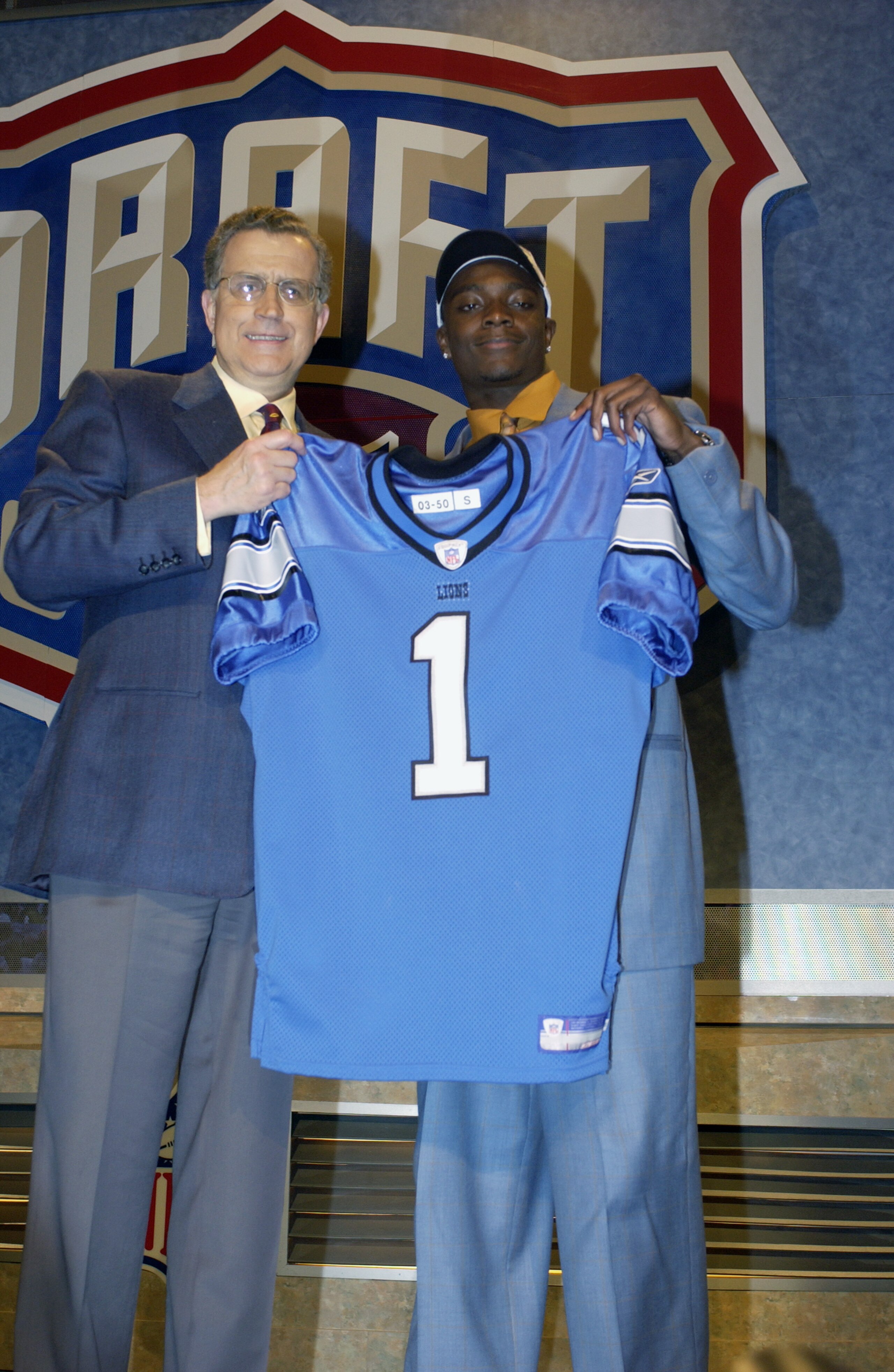 NEW YORK CITY - APRIL 26:  Charles Rogers from Michigan State was selected second overall by the Detroit Lions with NFL Commissioner Paul Tagliabue at the 2003 NFL Draft on April 26, 2003 at Madison Square Garden in New York City. (Photo by Ezra Shaw/Gett