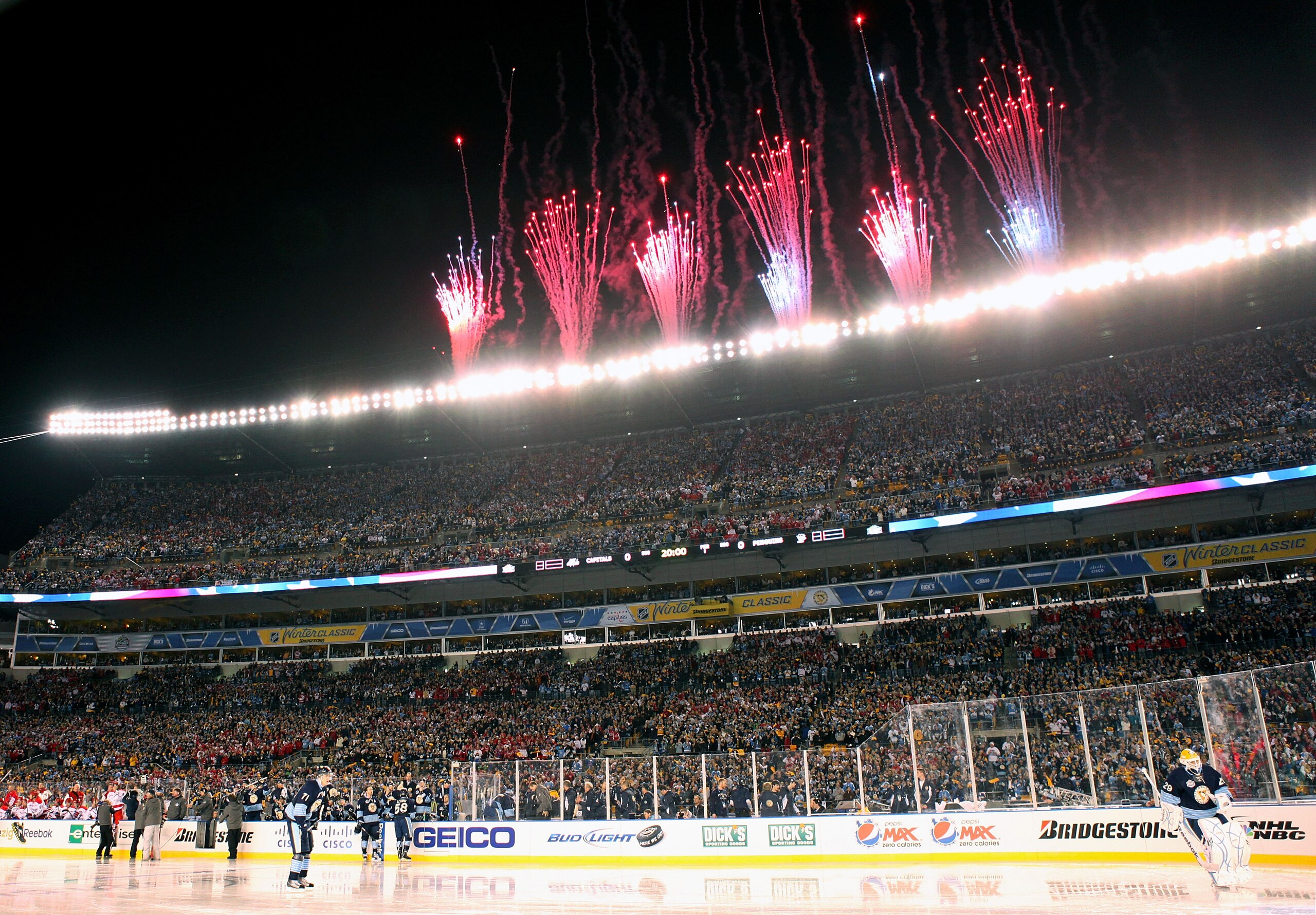 PITTSBURGH, PA - JANUARY 01:  Fireworks go off before the Pittsburgh Penguins take on the Washington Capitals during the 2011 NHL Bridgestone Winter Classic at Heinz Field on January 1, 2011 in Pittsburgh, Pennsylvania. Washington won 3-1.  (Photo by Jami