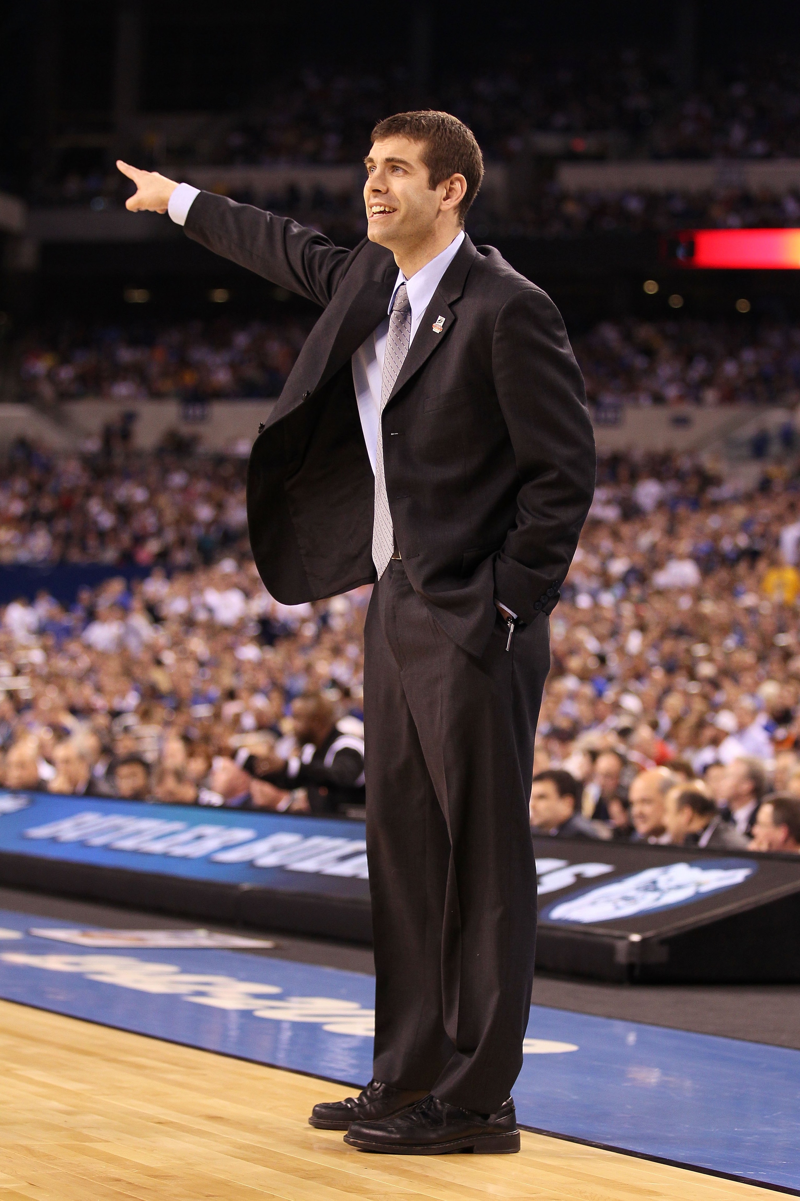 INDIANAPOLIS - APRIL 05:  Head coach Brad Stevens of the Butler Bulldogs smiles as he gestures against the Duke Blue Devils during the 2010 NCAA Division I Men's Basketball National Championship game at Lucas Oil Stadium on April 5, 2010 in Indianapolis,