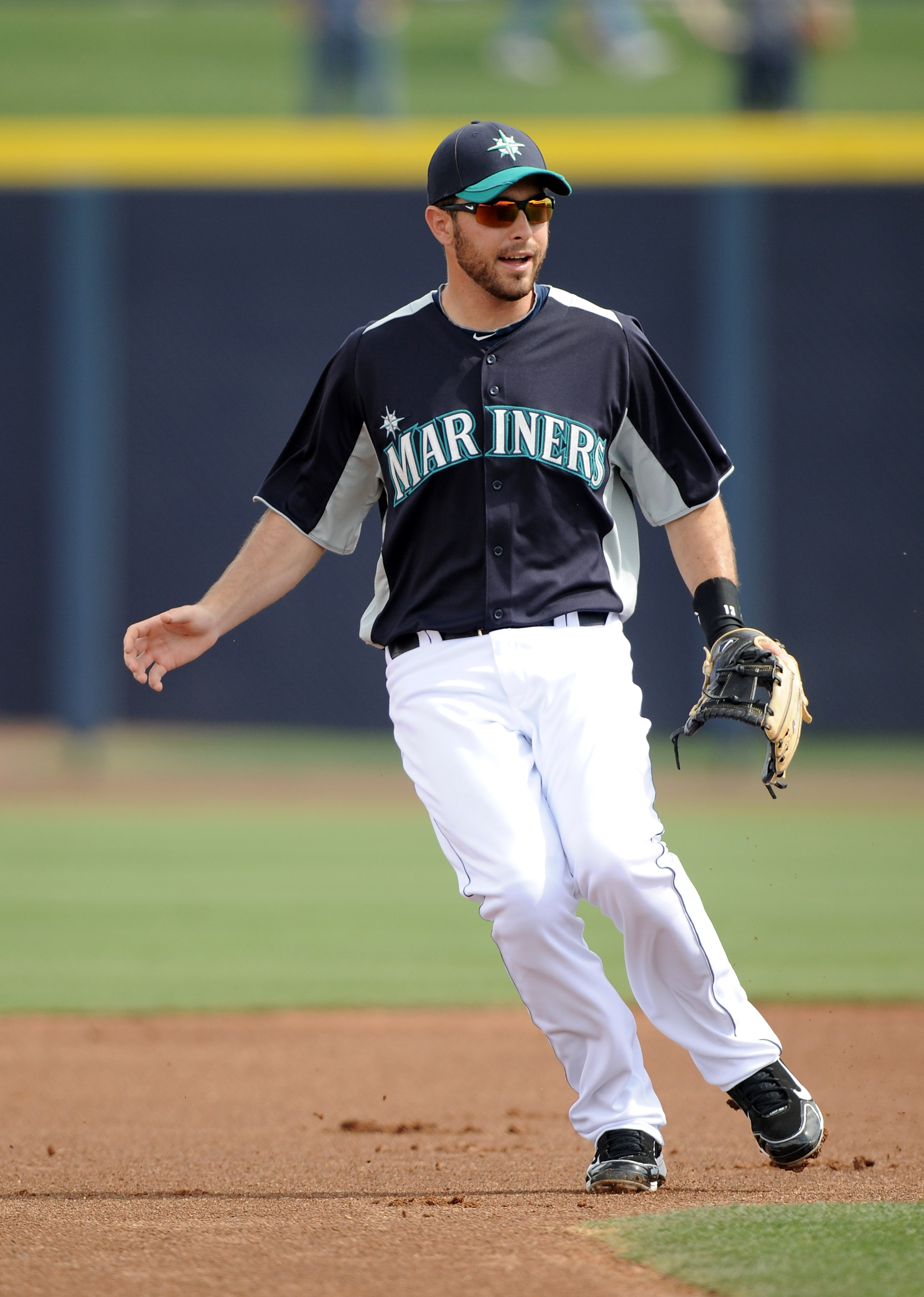 Seattle Mariners' Dustin Ackley connects with a pitch for a double