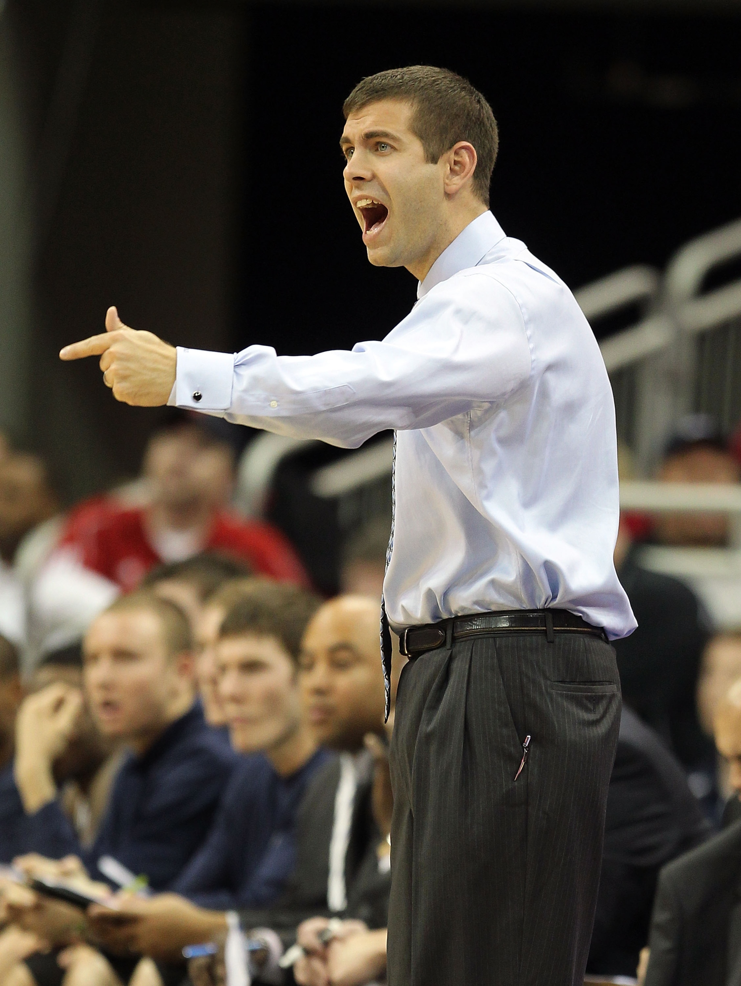 LOUISVILLE, KY - NOVEMBER 16:  Brad Stevens the Head Coach of the Butler Bulldogs gives instructions to his team during the game against the Louisville Cardinals  at the KFC Yum! Center on November 16, 2010 in Louisville, Kentucky.  (Photo by Andy Lyons/G