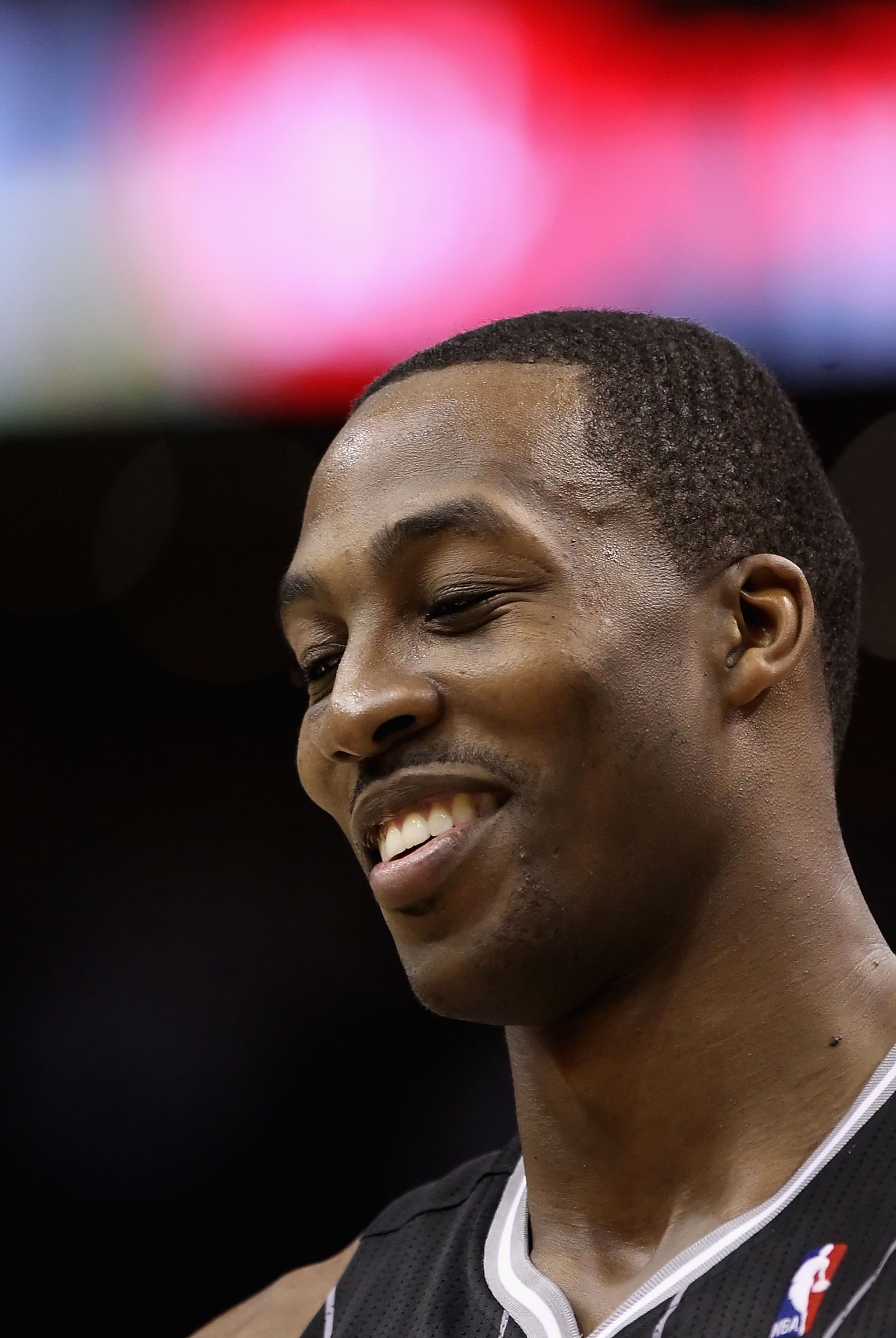 PHOENIX, AZ - MARCH 13: Dwight Howard #12 of the Orlando Magic during the NBA game against the Phoenix Suns at US Airways Center on March 13, 2011 in Phoenix, Arizona. The Magic defeated the Suns 111-88. NOTE TO USER: User expressly acknowledges and agre PHOENIX, AZ - MARCH 13: Dwight Howard #12 of the Orlando Magic during the NBA game against the Phoenix Suns at US Airways Center on March 13, 2011 in Phoenix, Arizona. The Magic defeated the Suns 111-88. NOTE TO USER: User expressly acknowledges and agre