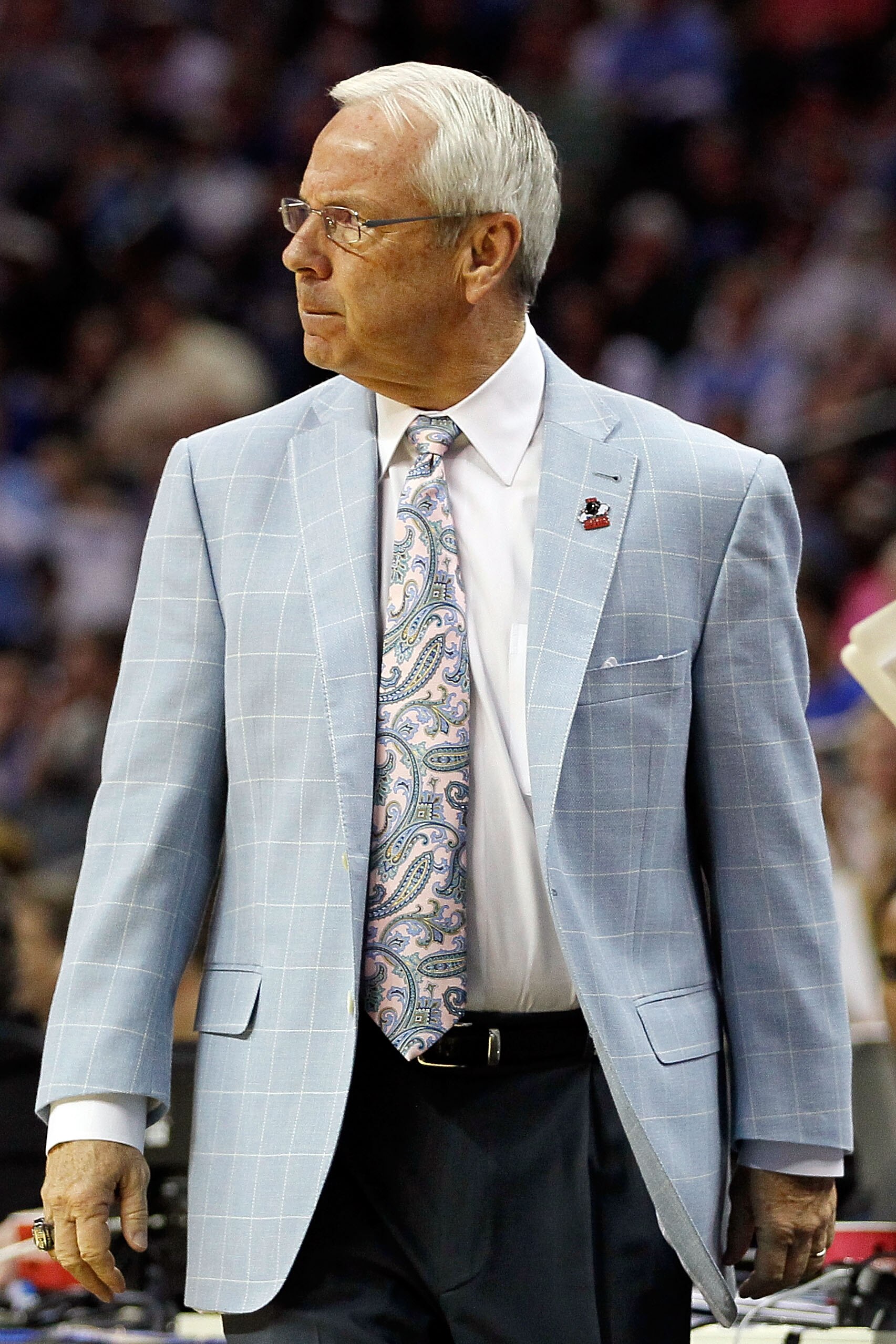 CHARLOTTE, NC - MARCH 20:  Head coach Roy Williams of the North Carolina Tar Heels looks on while taking on the Washington Huskies during the third round of the 2011 NCAA men's basketball tournament at Time Warner Cable Arena on March 20, 2011 in Charlott