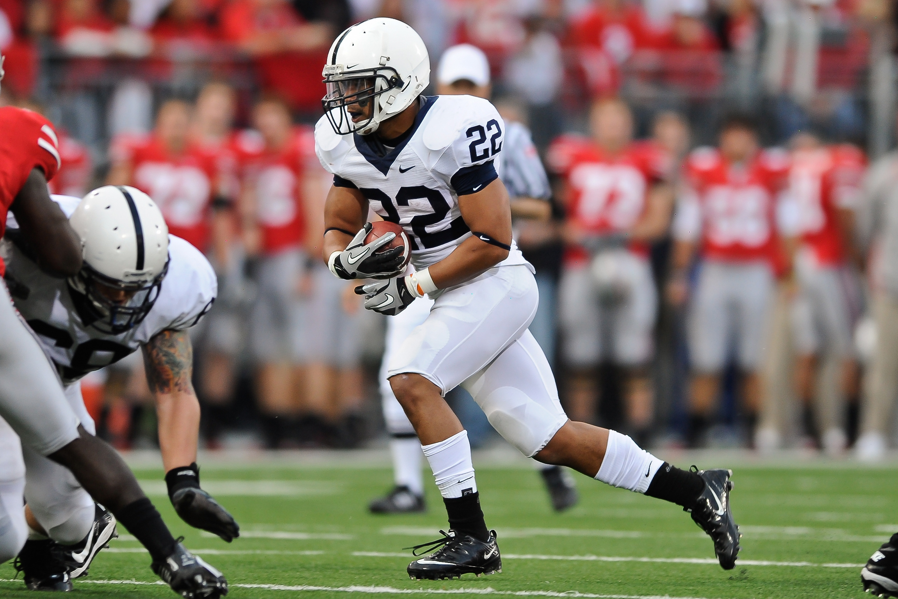 COLUMBUS, OH - NOVEMBER 13:  Evan Royster #22 of the Penn State Nittany Lions runs with the ball against the Ohio State Buckeyes at Ohio Stadium on November 13, 2010 in Columbus, Ohio.  (Photo by Jamie Sabau/Getty Images)