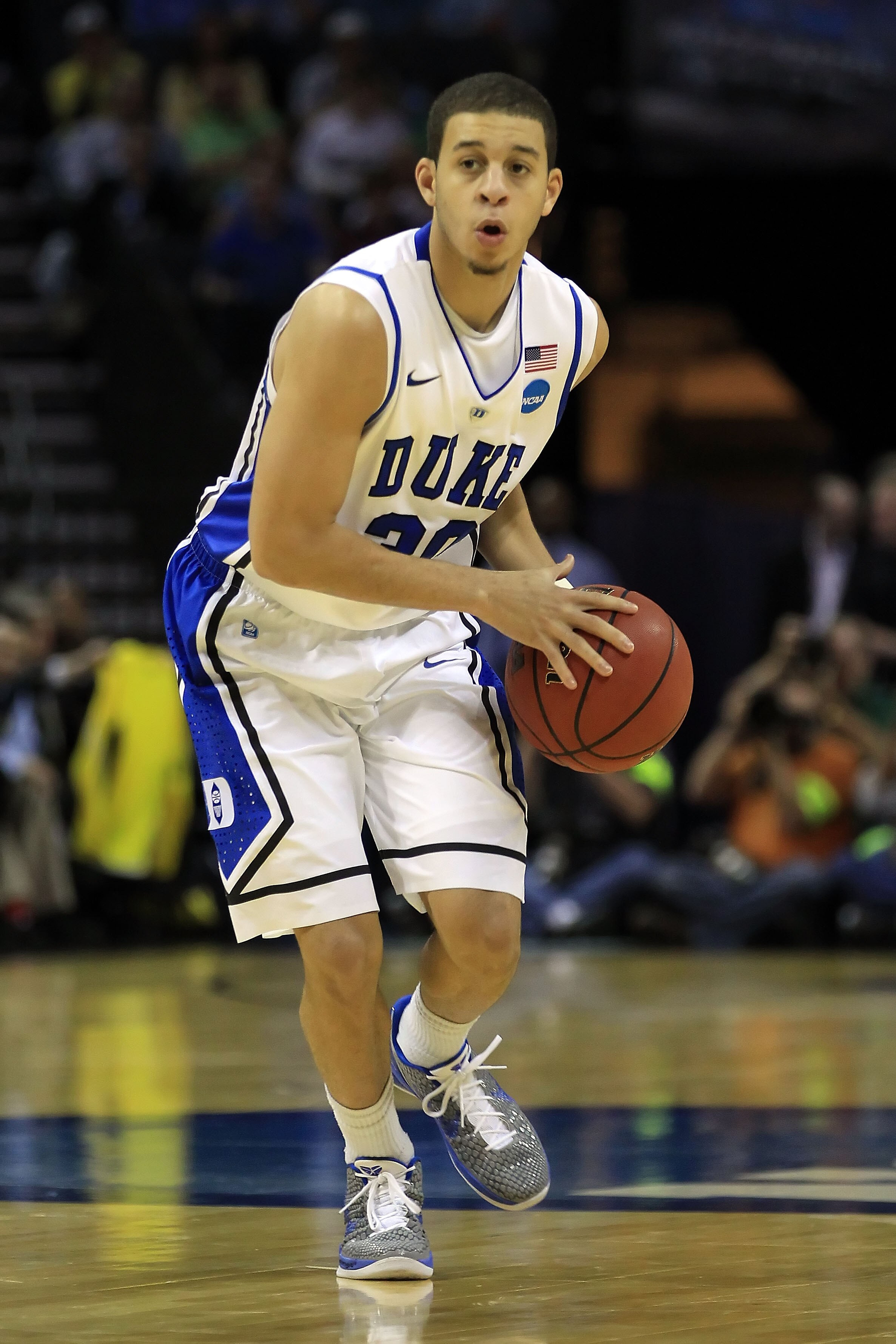 CHARLOTTE, NC - MARCH 20:  Seth Curry #30 of the Duke Blue Devils moves the ball while taking on the Michigan Wolverines during the third round of the 2011 NCAA men's basketball tournament at Time Warner Cable Arena on March 20, 2011 in Charlotte, North C