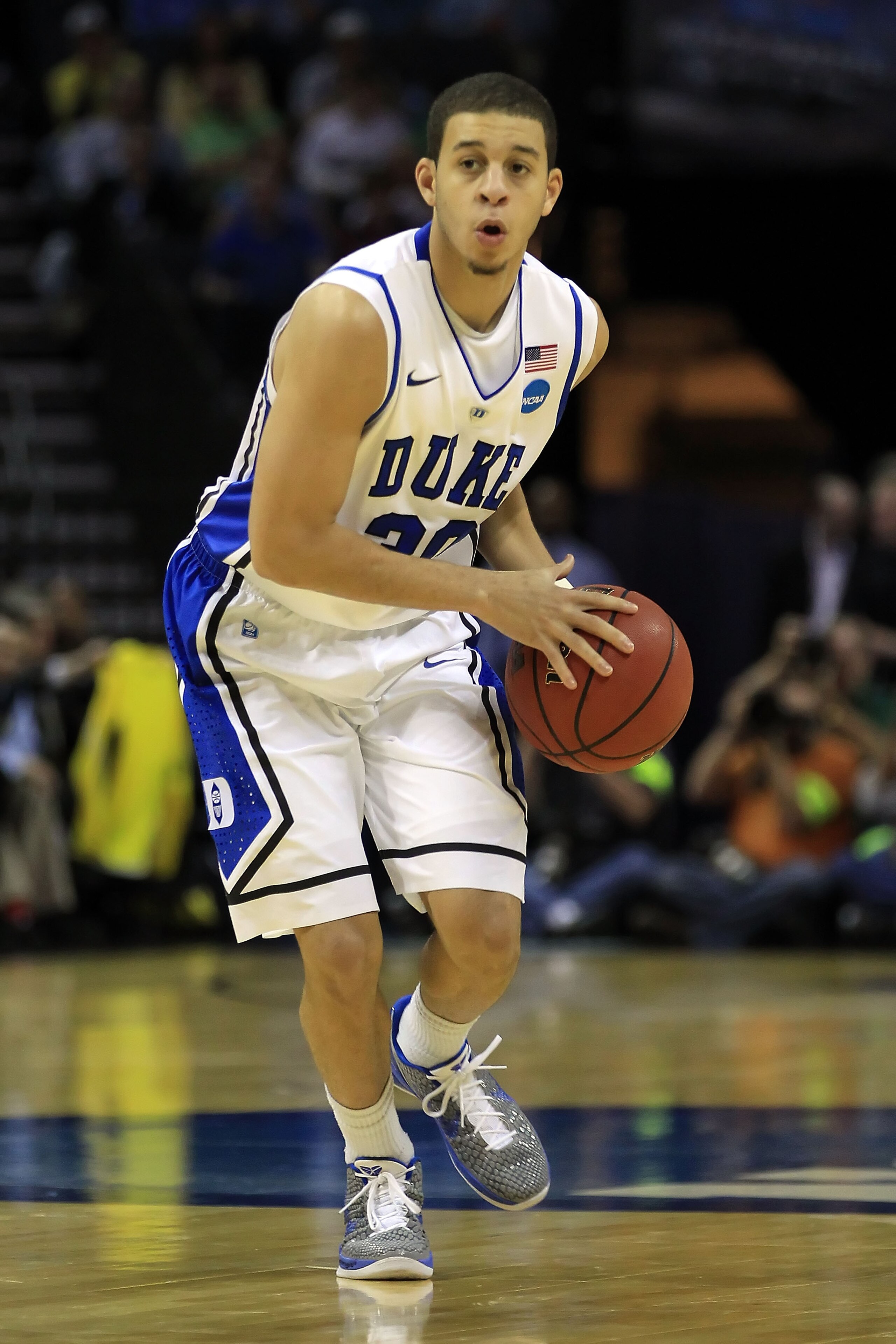 CHARLOTTE, NC - MARCH 20: Seth Curry #30 of the Duke Blue Devils moves the ball while taking on the Michigan Wolverines during the third round of the 2011 NCAA men's basketball tournament at Time Warner Cable Arena on March 20, 2011 in Charlotte, North C CHARLOTTE, NC - MARCH 20: Seth Curry #30 of the Duke Blue Devils moves the ball while taking on the Michigan Wolverines during the third round of the 2011 NCAA men's basketball tournament at Time Warner Cable Arena on March 20, 2011 in Charlotte, North C