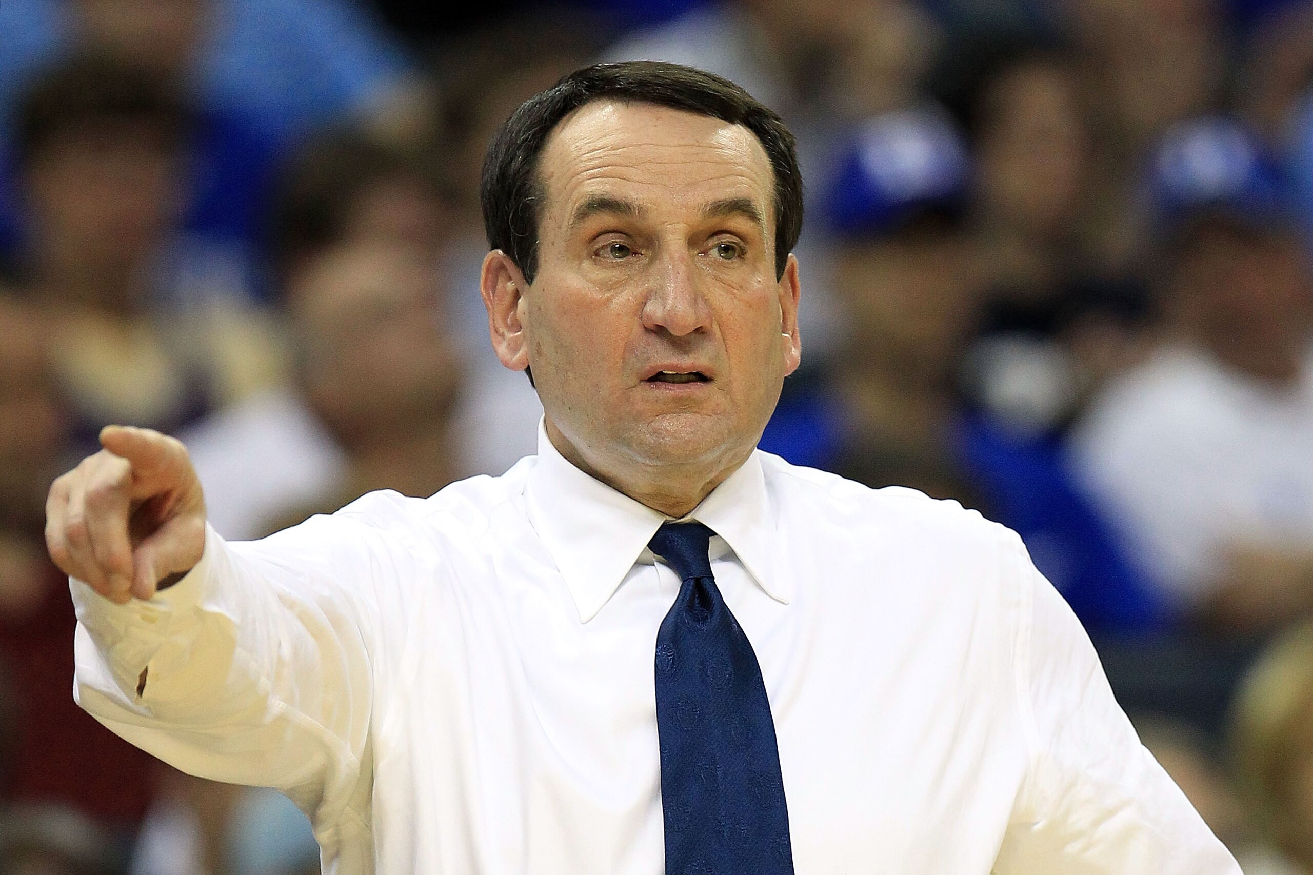 CHARLOTTE, NC - MARCH 20: Head coach Mike Krzyzewski of the Duke Blue Devils reacts while taking on the Michigan Wolverines during the third round of the 2011 NCAA men's basketball tournament at Time Warner Cable Arena on March 20, 2011 in Charlotte, Nor CHARLOTTE, NC - MARCH 20: Head coach Mike Krzyzewski of the Duke Blue Devils reacts while taking on the Michigan Wolverines during the third round of the 2011 NCAA men's basketball tournament at Time Warner Cable Arena on March 20, 2011 in Charlotte, Nor