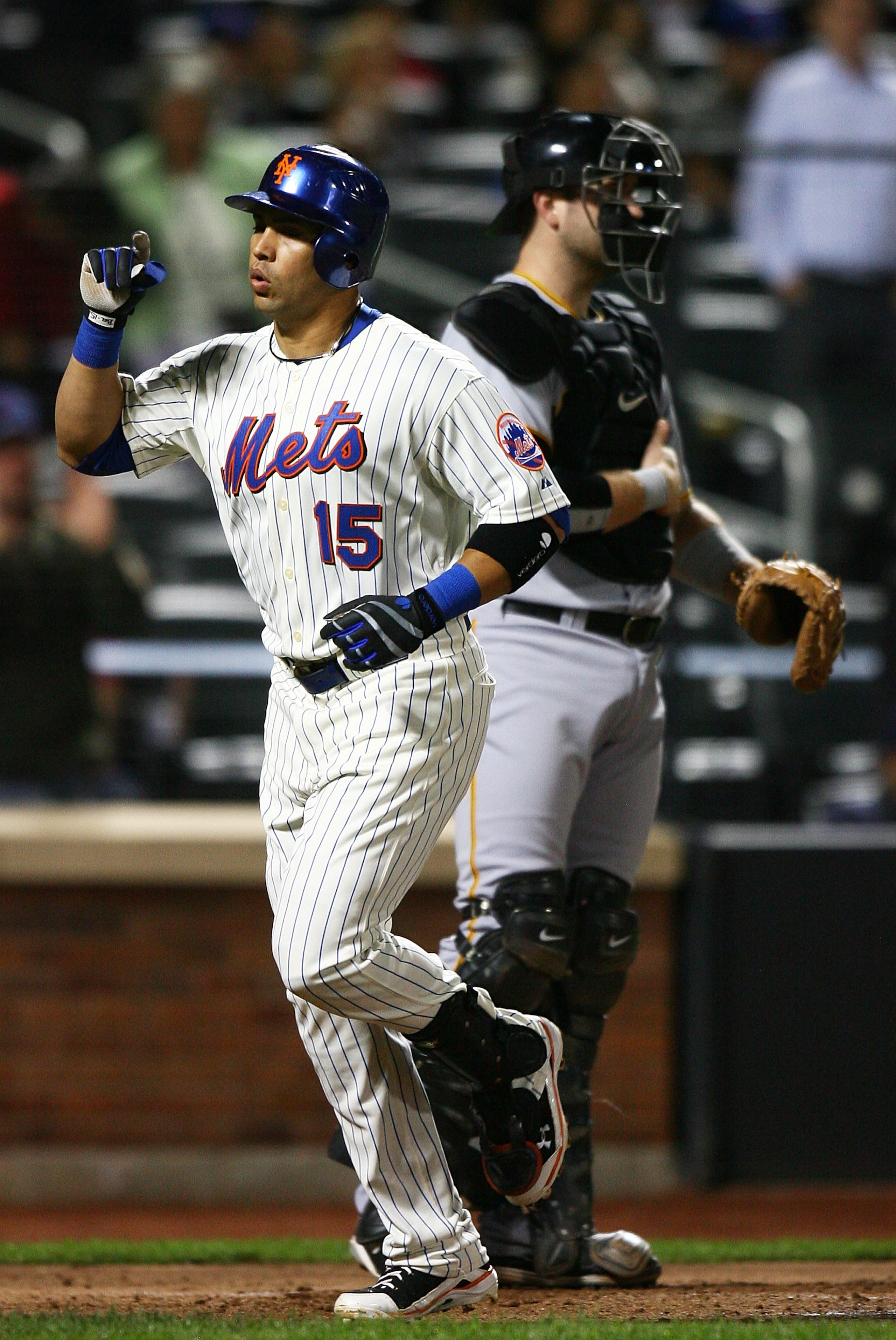 NEW YORK - SEPTEMBER 14:  Carlos Beltran #15 of the New York Mets celebrates after hitting a home run in the third inning against the Pittsburgh Pirates on September 14, 2010 at Citi Field in the Flushing neighborhood of the Queens borough of New York Cit