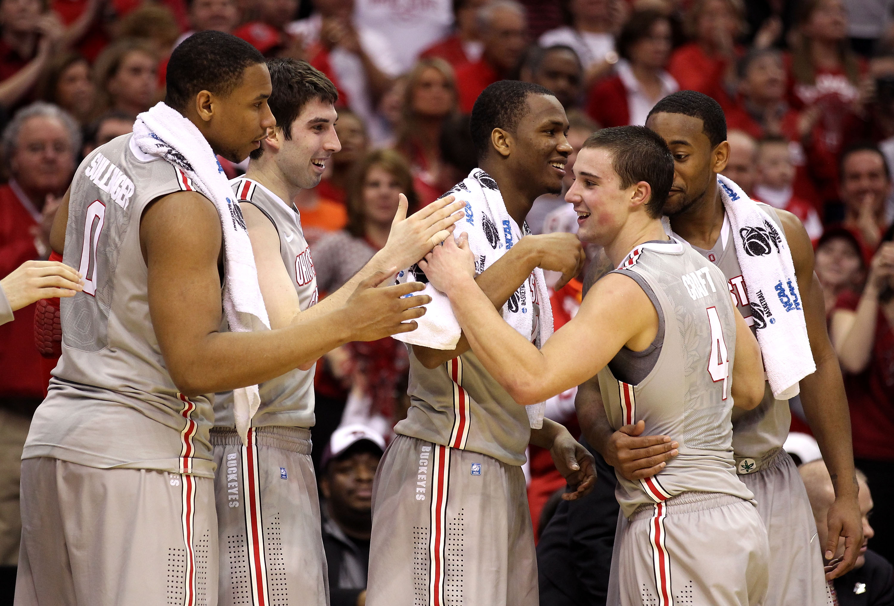 CLEVELAND, OH - MARCH 20: Jared Sullinger #0, Jon Diebler #33, William Buford #44 and David Lighty #23 of the Ohio State Buckeyes greet Aaron Craft #4 as he comes to the bench late in the game against the George Mason Patriots during the third of the 2011 CLEVELAND, OH - MARCH 20: Jared Sullinger #0, Jon Diebler #33, William Buford #44 and David Lighty #23 of the Ohio State Buckeyes greet Aaron Craft #4 as he comes to the bench late in the game against the George Mason Patriots during the third of the 2011