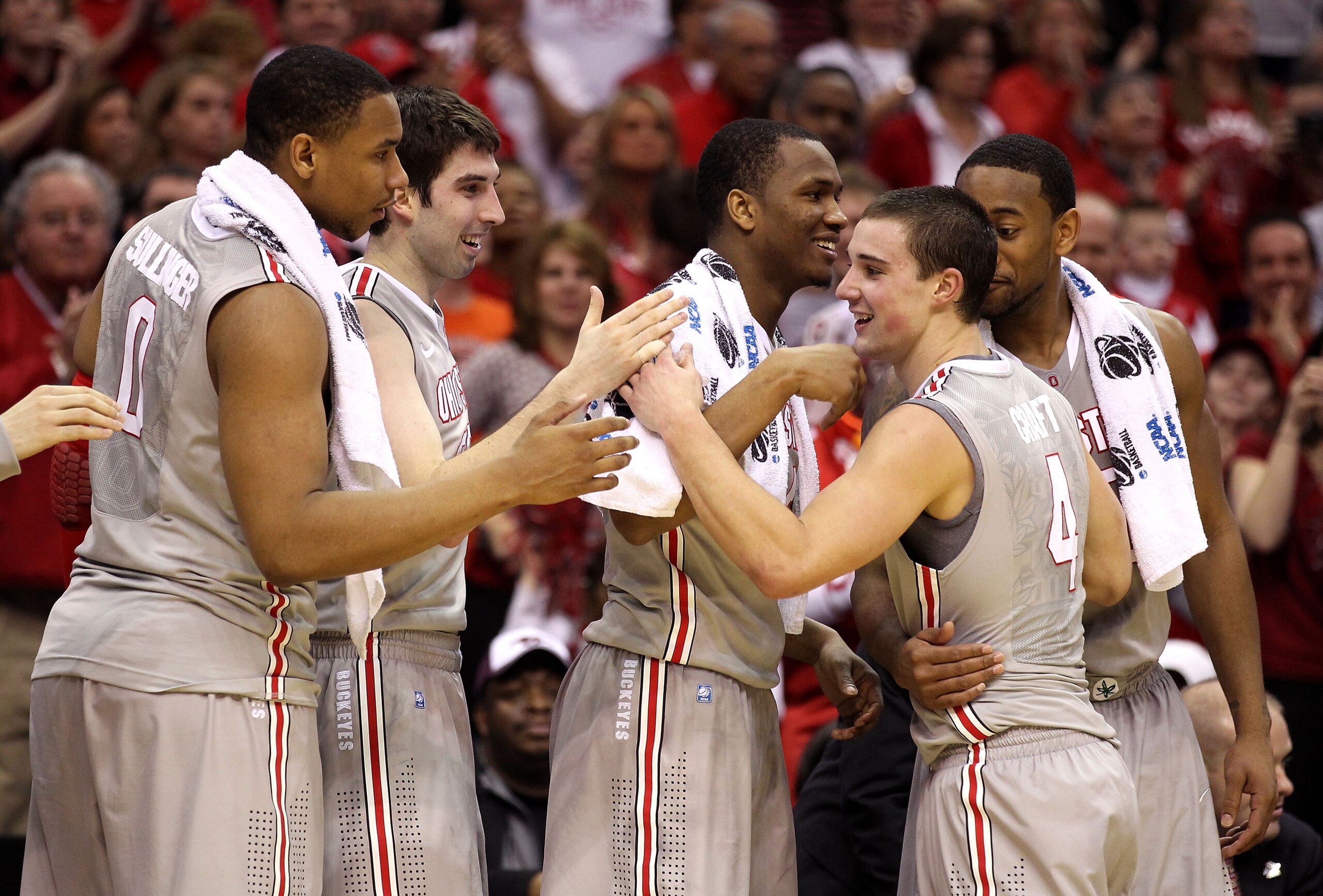 CLEVELAND, OH - MARCH 20: Jared Sullinger #0, Jon Diebler #33, William Buford #44 and David Lighty #23 of the Ohio State Buckeyes greet Aaron Craft #4 as he comes to the bench late in the game against the George Mason Patriots during the third of the 2011 CLEVELAND, OH - MARCH 20: Jared Sullinger #0, Jon Diebler #33, William Buford #44 and David Lighty #23 of the Ohio State Buckeyes greet Aaron Craft #4 as he comes to the bench late in the game against the George Mason Patriots during the third of the 2011