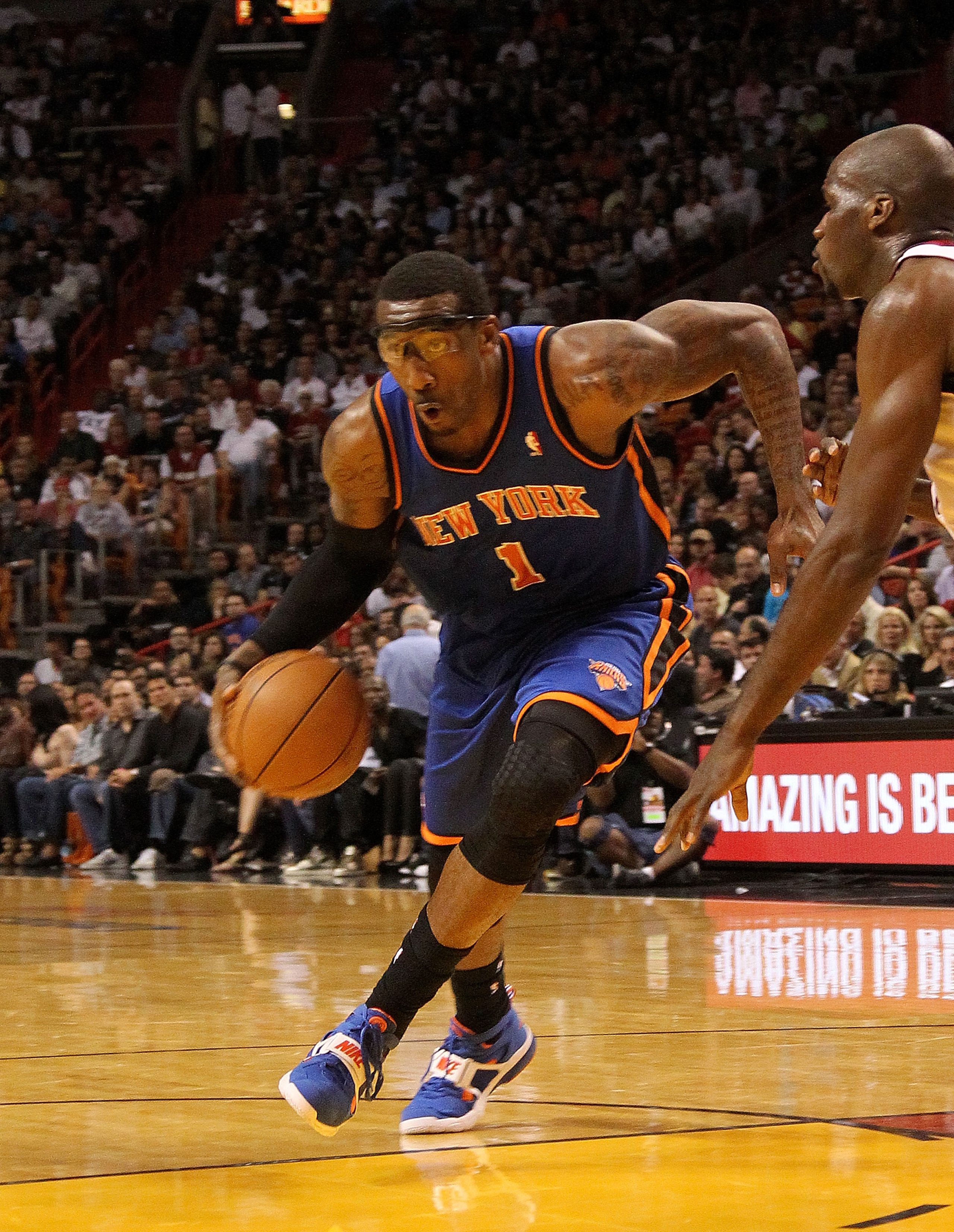 MIAMI, FL - FEBRUARY 27: Amar'e Stoudemire #1 of the New York Knicks drives to the basket during a game against the the Miami Heat at American Airlines Arena on February 27, 2011 in Miami, Florida. NOTE TO USER: User expressly acknowledges and agrees tha MIAMI, FL - FEBRUARY 27: Amar'e Stoudemire #1 of the New York Knicks drives to the basket during a game against the the Miami Heat at American Airlines Arena on February 27, 2011 in Miami, Florida. NOTE TO USER: User expressly acknowledges and agrees tha