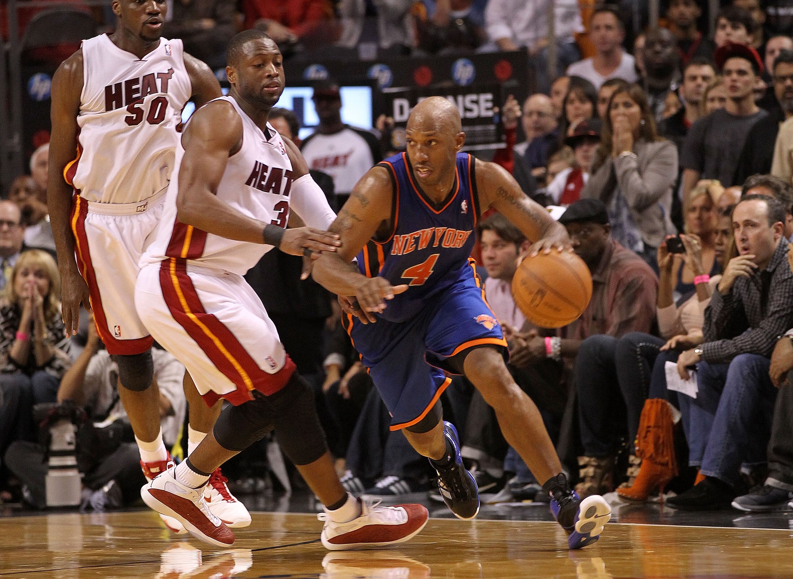 MIAMI, FL - FEBRUARY 27: Chauncey Billups #4 of the New York Knicks drives past Dwyane Wade #3 of the Miami Heat during a game at American Airlines Arena on February 27, 2011 in Miami, Florida. NOTE TO USER: User expressly acknowledges and agrees that, b MIAMI, FL - FEBRUARY 27: Chauncey Billups #4 of the New York Knicks drives past Dwyane Wade #3 of the Miami Heat during a game at American Airlines Arena on February 27, 2011 in Miami, Florida. NOTE TO USER: User expressly acknowledges and agrees that, b