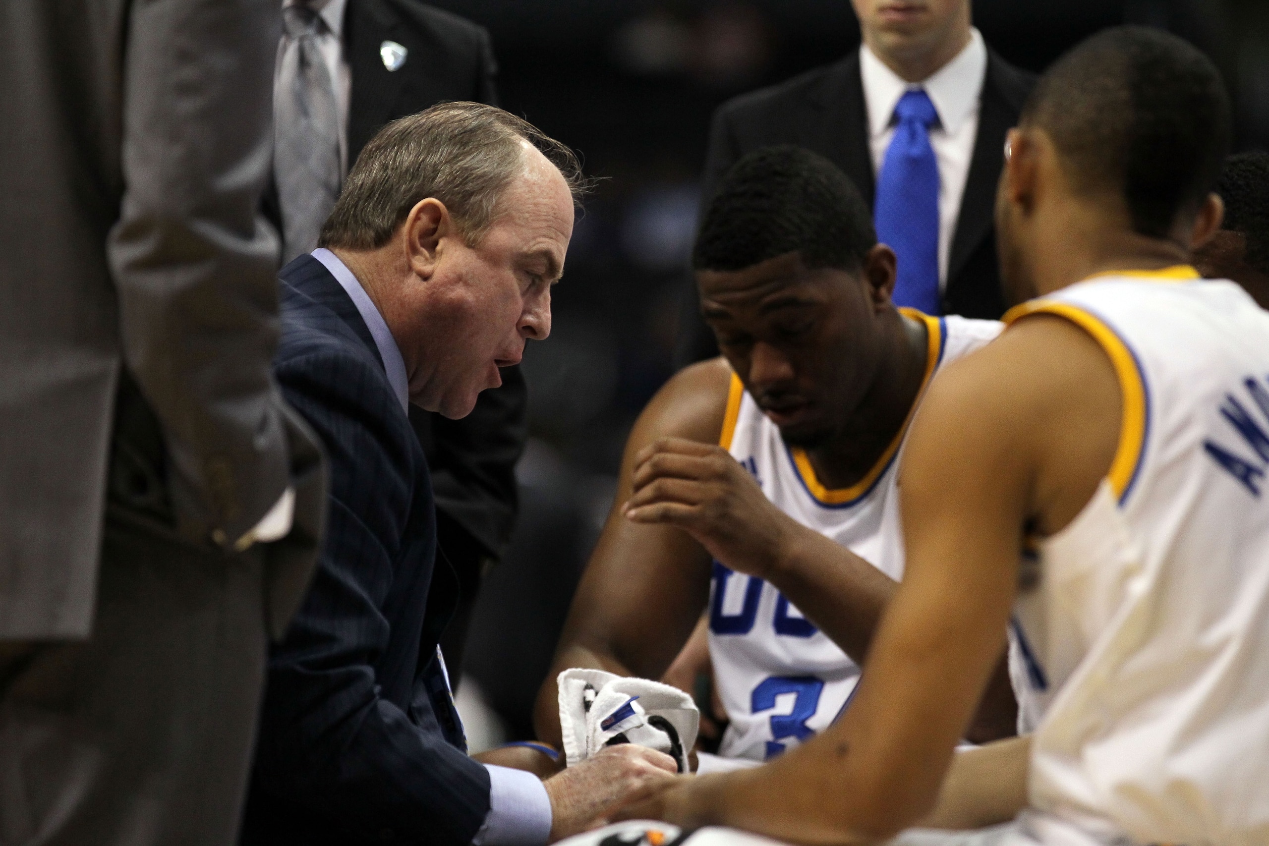 LOS ANGELES, CA - MARCH 10:  Head coach Ben Howland of the UCLA Bruins talks with his team during a timeout in the quarterfinals of the 2011 Pacific Life Pac-10 Men's Basketball Tournament at Staples Center on March 10, 2011 in Los Angeles, California.  (