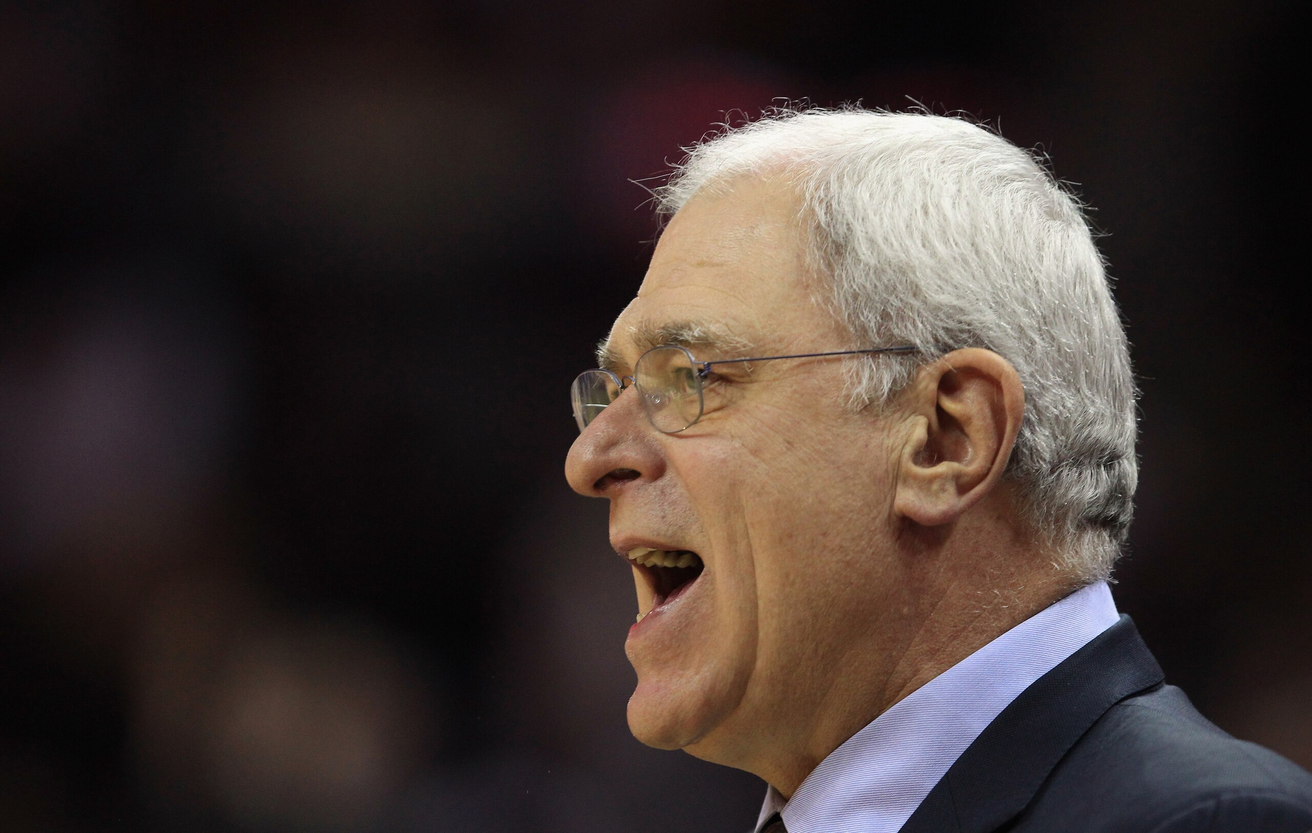 CHARLOTTE, NC - FEBRUARY 14:  Head coach Phil Jackson of the Los Angeles Lakers yells at his team against the Charlotte Bobcats during their game at Time Warner Cable Arena on February 14, 2011 in Charlotte, North Carolina. NOTE TO USER: User expressly ac