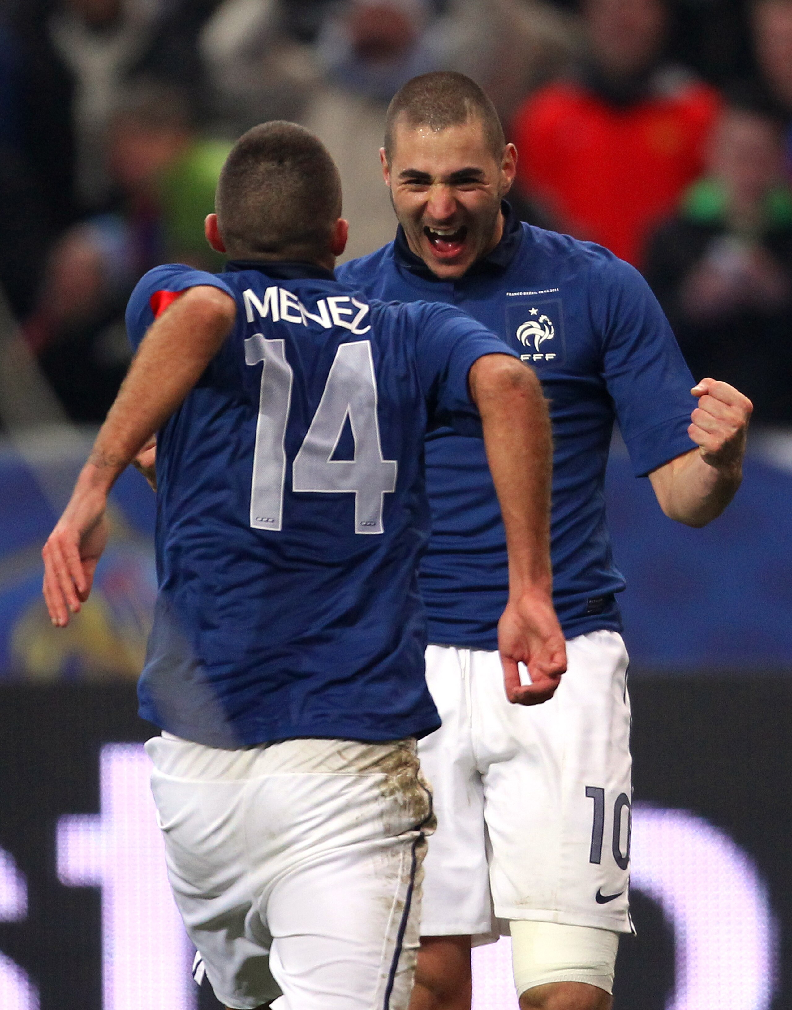 PARIS, FRANCE - FEBRUARY 09:  Karim Benzema of France celebrates with Jeremy Menez after scoring the winning goal during the International friendly match between France and Brazil at Stade de France on February 9, 2011 in Paris, France.  (Photo by Alex Li