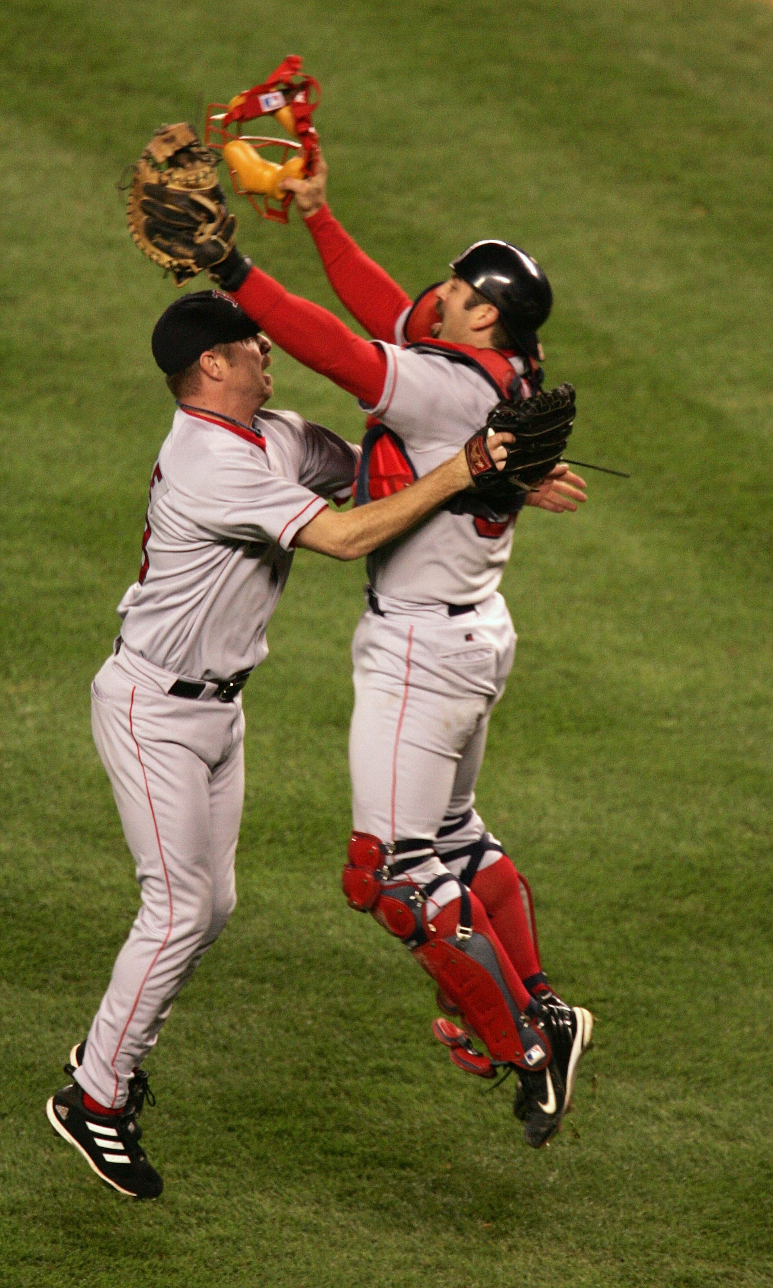 NEW YORK - OCTOBER 20: Alan Embree #43 and Jason Varitek #33 of the Boston Red Sox celebrate after defeating the New York Yankees 10-3 to win game seven of the American League Championship Series on October 20, 2004 at Yankee Stadium in the Bronx borough NEW YORK - OCTOBER 20: Alan Embree #43 and Jason Varitek #33 of the Boston Red Sox celebrate after defeating the New York Yankees 10-3 to win game seven of the American League Championship Series on October 20, 2004 at Yankee Stadium in the Bronx borough