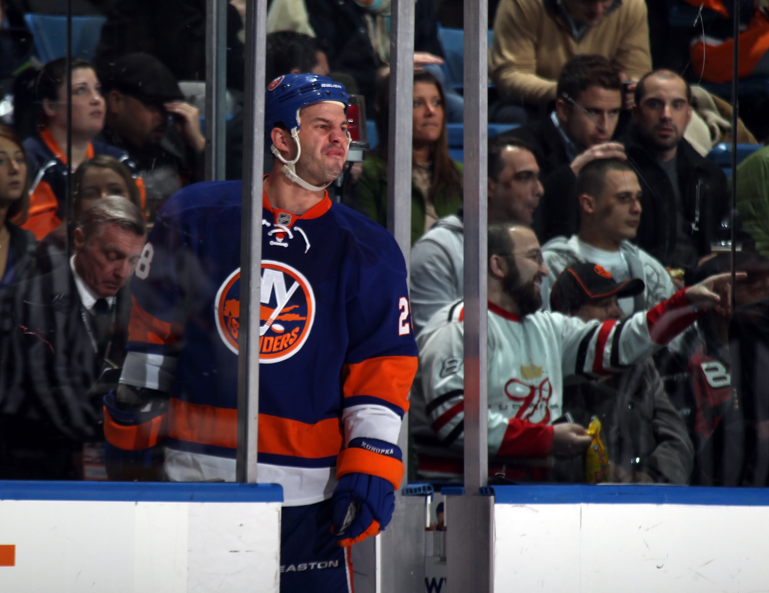 UNIONDALE, NY - MARCH 02:  Zenon Konopka #28 of the New York Islanders argues a penalty call in his game against the Minnesota Wild at the Nassau Coliseum on March 2, 2011 in Uniondale, New York. The Islanders defeated the Wild 4-1. (Photo by Bruce Bennet