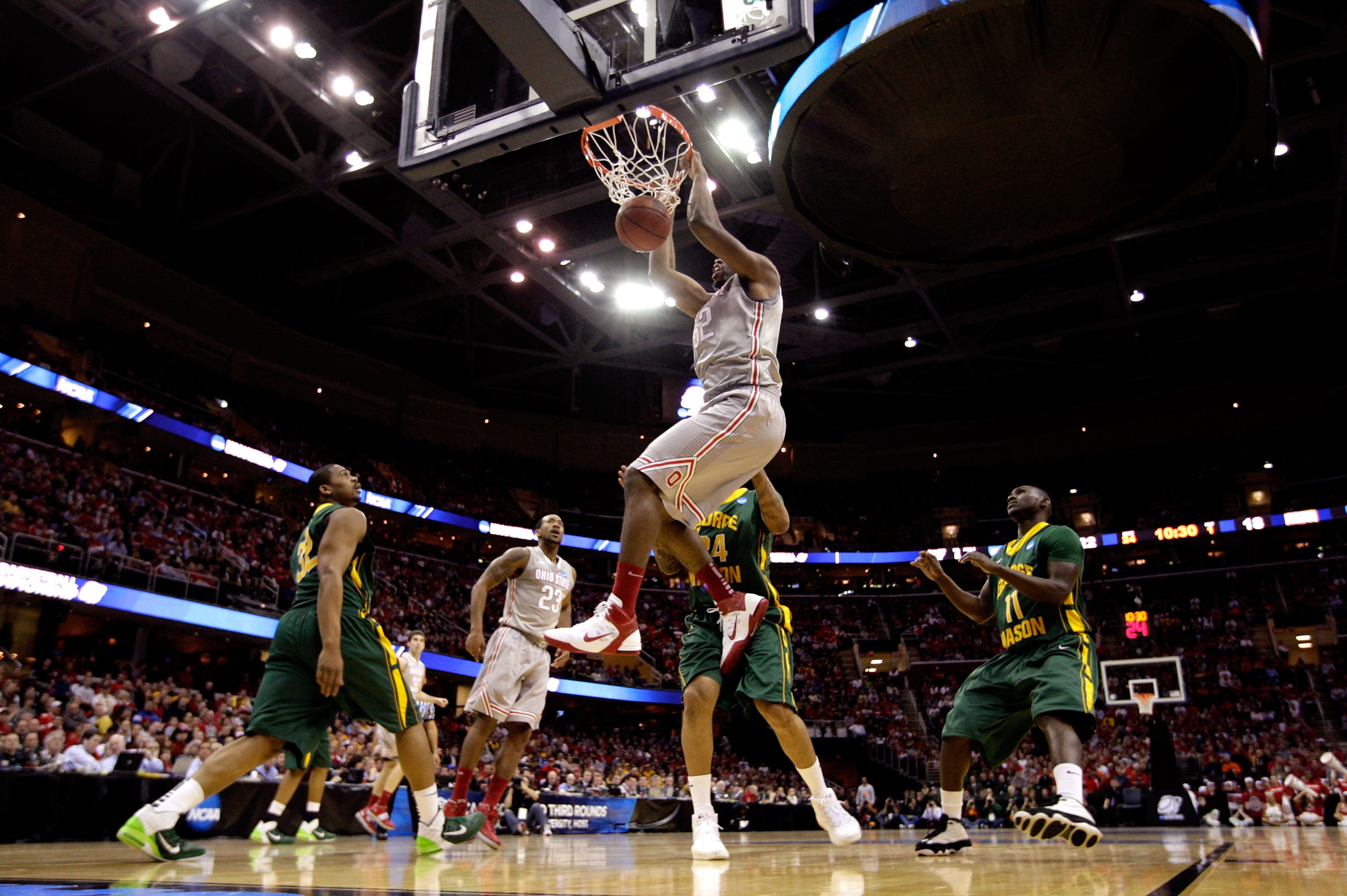 CLEVELAND, OH - MARCH 20: Dallas Lauderdale #52 of the Ohio State Buckeyes goes up for a dunk against the George Mason Patriots during the third of the 2011 NCAA men's basketball tournament at Quicken Loans Arena on March 20, 2011 in Cleveland, Ohio.  (Ph