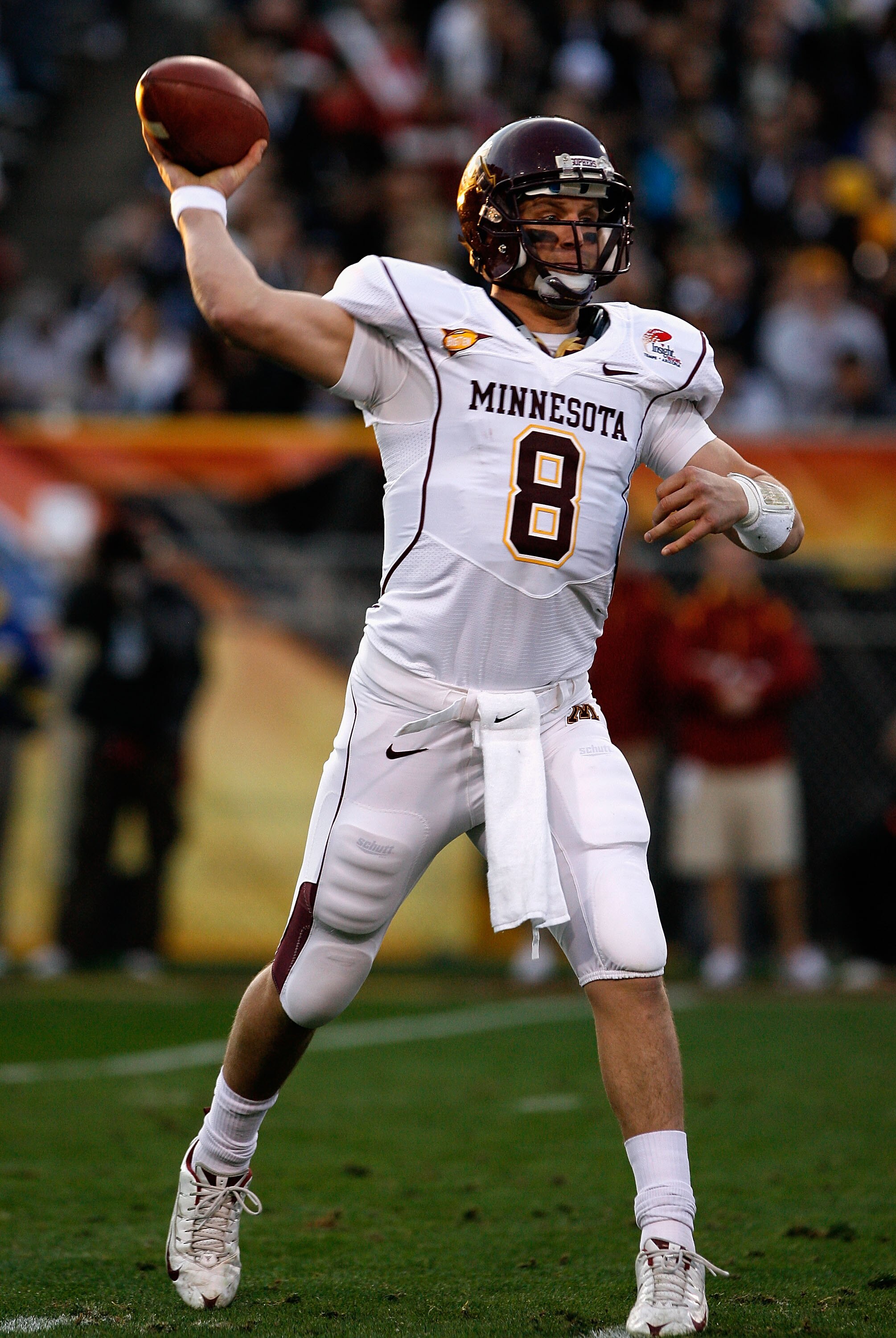 TEMPE, AZ - DECEMBER 31:  Quarterback Adam Weber #8 of the Minnesota Golden Gophers throws a pass during the second quarter of the Insight Bowl against the Iowa State Cyclones at Arizona Stadium on December 31, 2009 in Tempe, Arizona.  (Photo by Christian