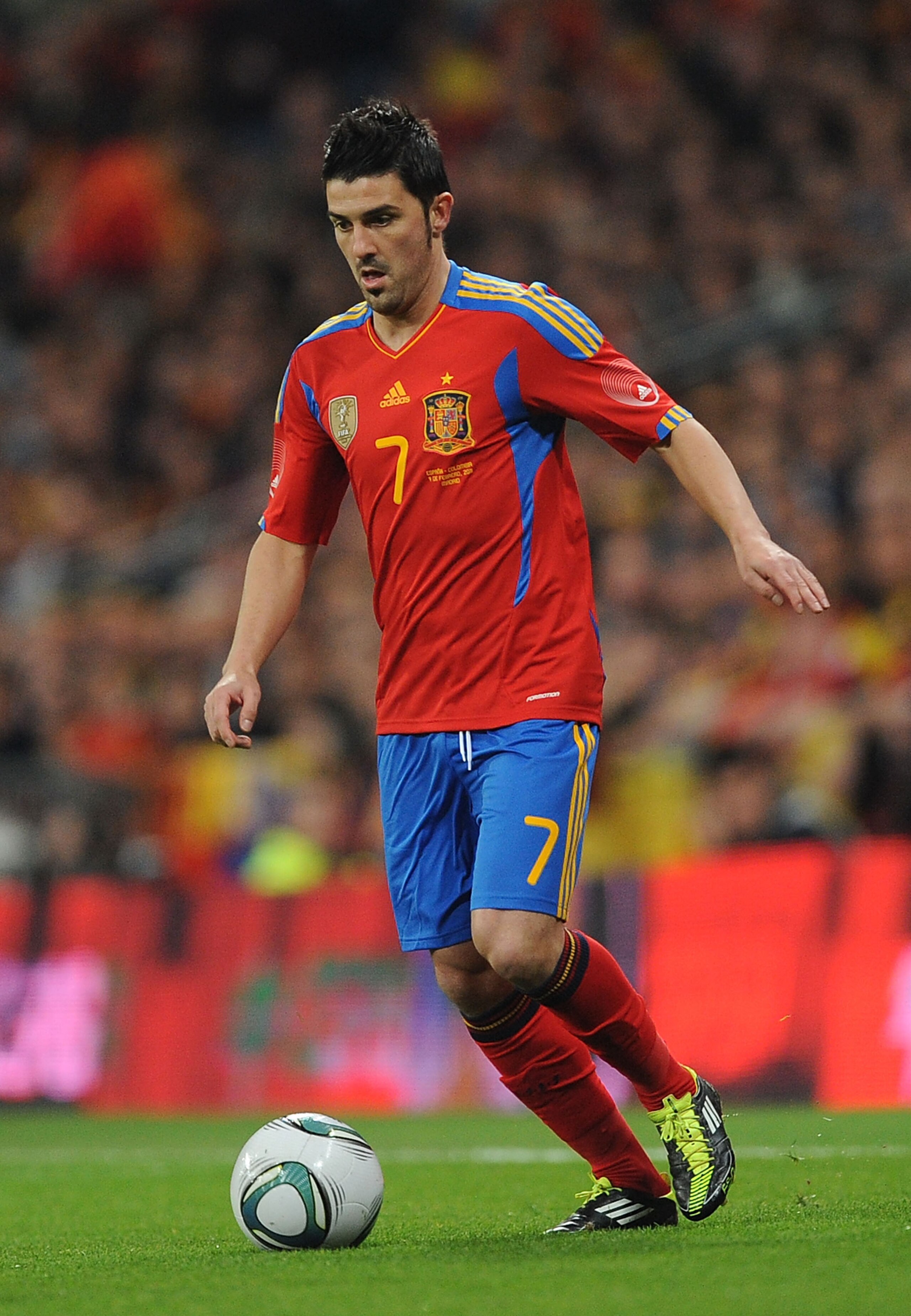 MADRID, SPAIN - FEBRUARY 09:  David Villa of Spain in action during the International friendly match between Spain and Colombia at Estadio Santiago Bernabeu on February 9, 2011 in Madrid, Spain.  (Photo by Denis Doyle/Getty Images)