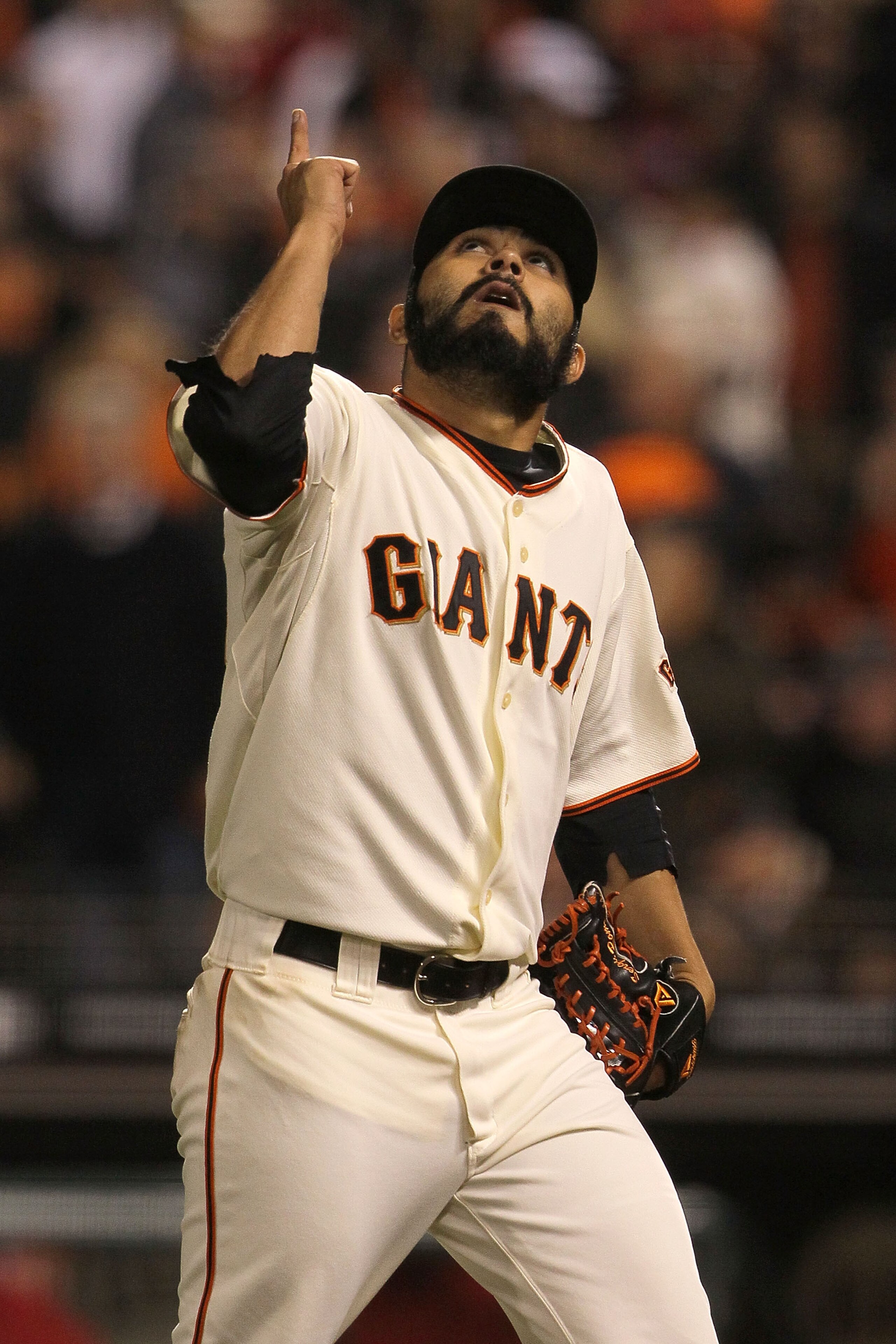 SAN FRANCISCO - OCTOBER 20:  Sergio Romo #54 of the San Francisco Giants reacts while taking on the Philadelphia Phillies in the eighth inning of Game Four of the NLCS during the 2010 MLB Playoffs at AT&T Park on October 20, 2010 in San Francisco, Califor